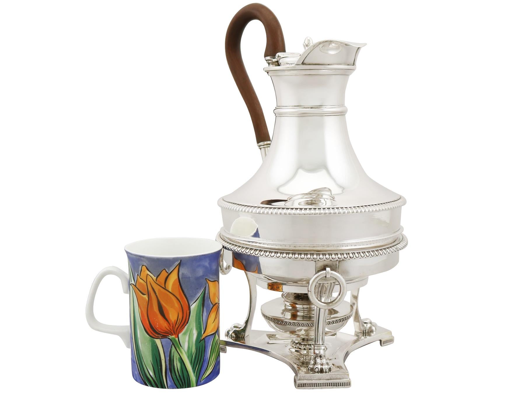 An exceptional, fine and impressive antique George III English sterling silver coffee jug with spirit burner made by Paul Storr; an addition to our Georgian silver teaware collection.

This exceptional antique George III English sterling silver
