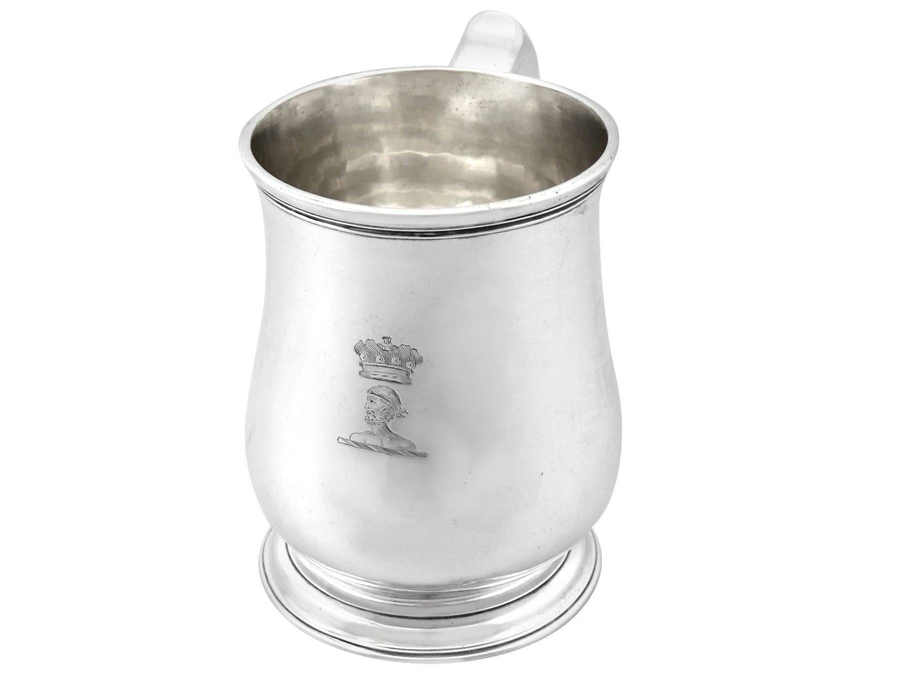 An exceptional, fine and impressive antique George II English sterling silver lady's mug by Gabriel Sleath; an addition to our Georgian silverware collection.

This exceptional antique early George II sterling silver mug has a plain baluster