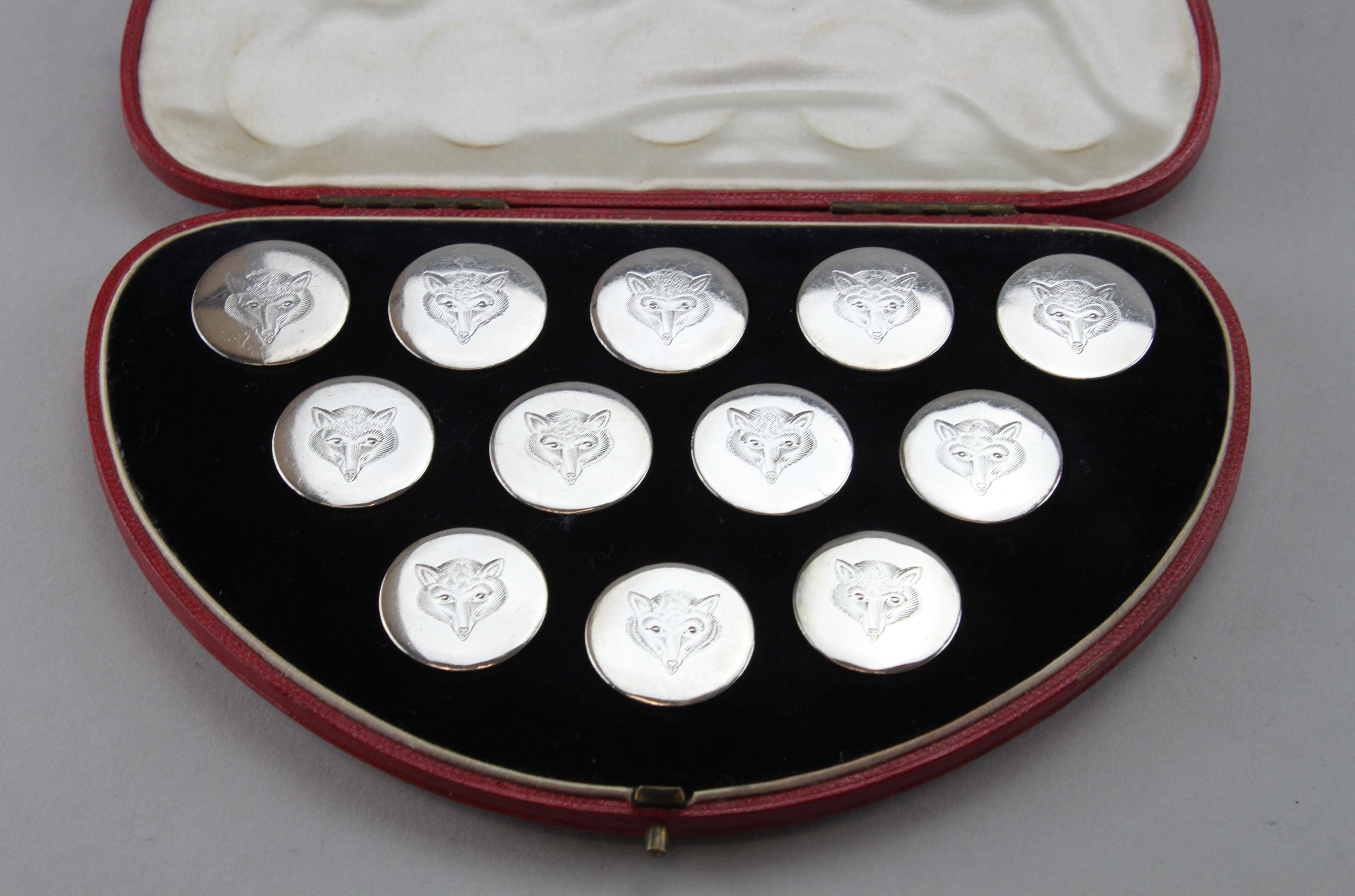 Antique Georgian sterling silver set of 12 shirt buttons.
Made in London circa 1790.
Maker : John Rich
Fully Hallmarked

Dimensions - 
Diameter x height : 1.5 x 0.7 cm
Total weight approx 60 grams

Condition: Has some surface wear and tear