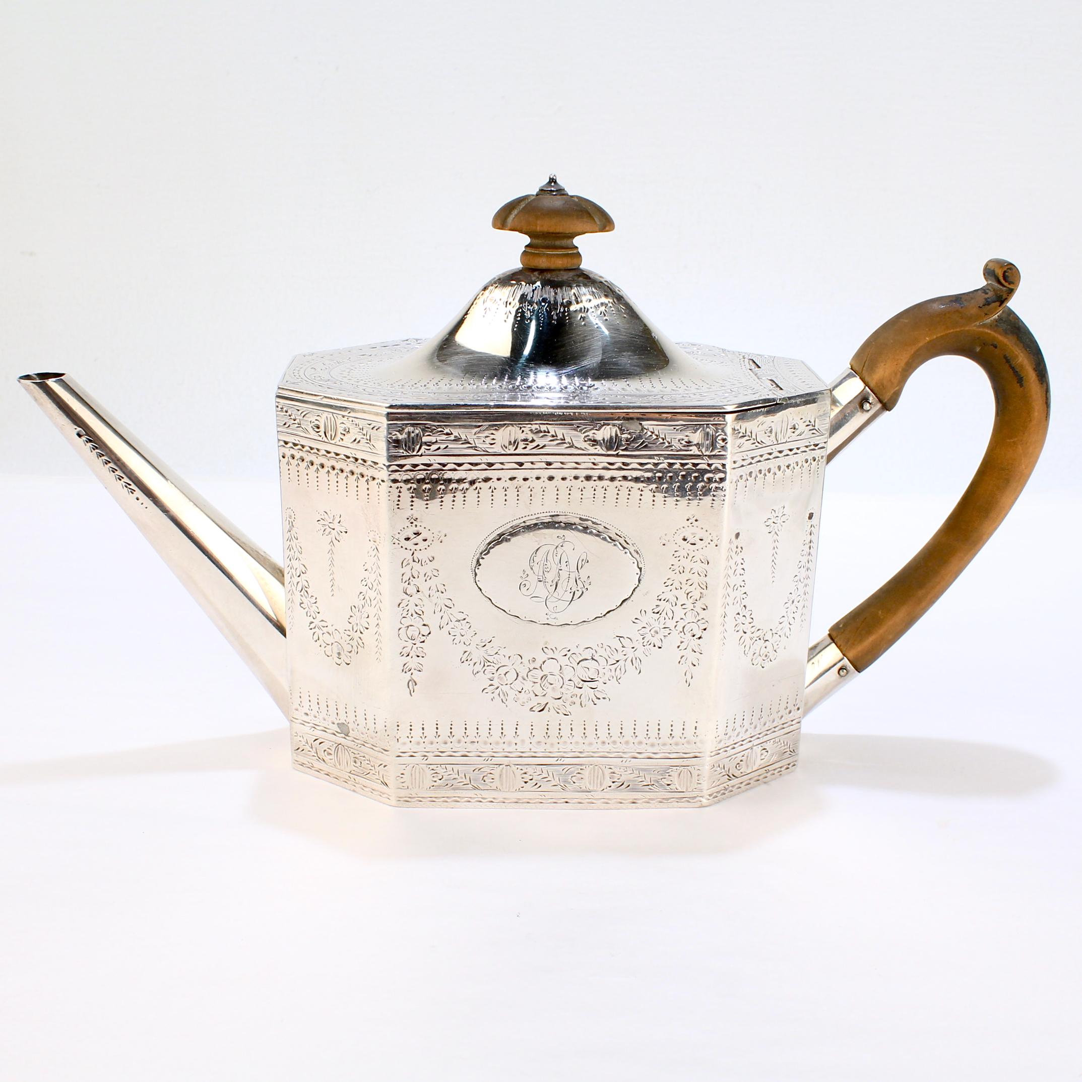 A fine English Georgian sterling silver teapot.

Marked for William Sumner I. 

With hand-chased decoration throughout and a wooden handle & finial that retain traces of their ebonized finish.

Simply a fine Georgian teapot!

Date:
1787

Overall