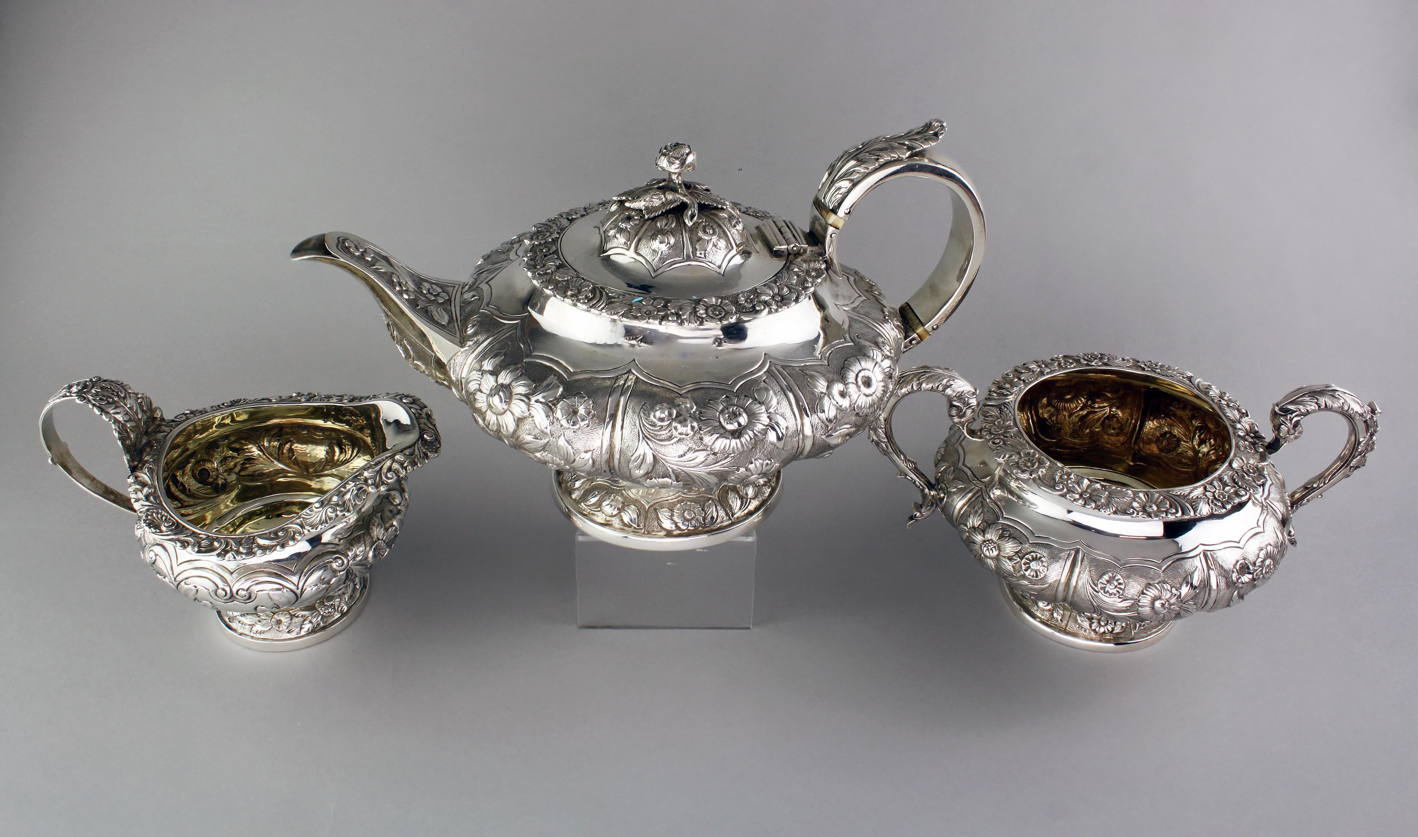 Antique Georgian (George III era) sterling silver three-piece tea service set
Maker: Richard Pearce & George Burrows & William Hewitt
Made in London 1828 and 1829
Fully hallmarked.

Dimensions:
Teapot size: 28.5 x 19 x 15.7 cm
Cream jar size: