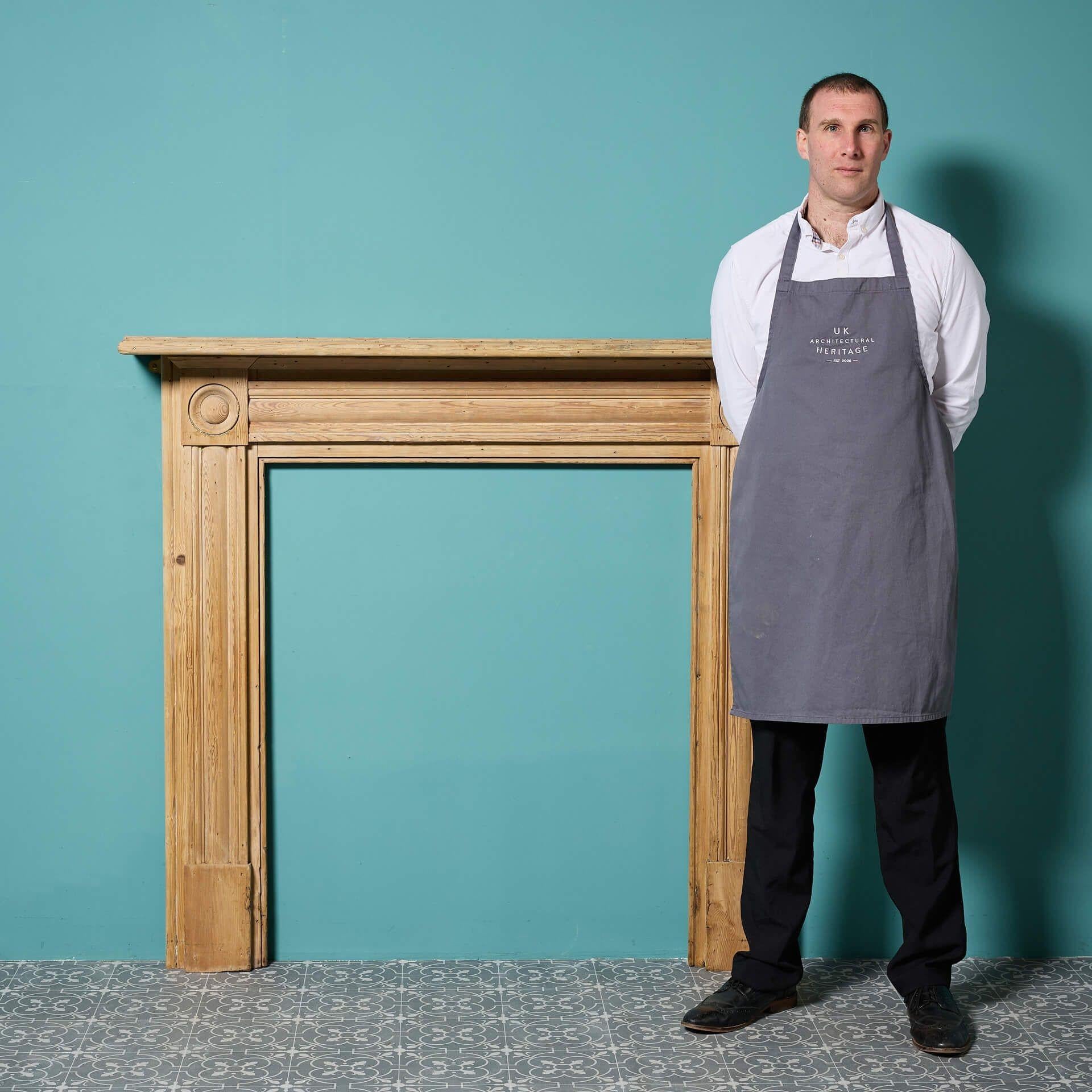 An antique Georgian stripped pine bullseye style fireplace.

At over 200 years old, though the design is simple, the Georgian style surround speaks volumes in an interior, ornamented with round ‘bullseye’ details on each end block alongside a