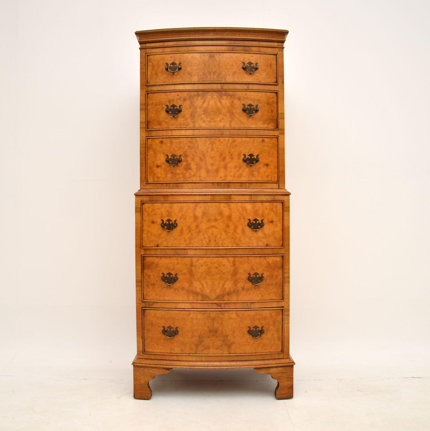 A gorgeous burr walnut chest on chest of drawers, in the antique Georgian style, dating from around the 1930’s period.

The quality is lovely, this has beautiful burr walnut veneers and original brass handles. It is of lovely proportions, the
