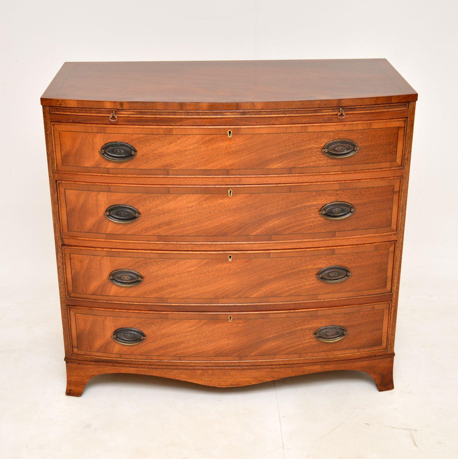 A smart and very well made antique chest of drawers in the Georgian style. This was made in England, it dates from around the 1950’s.

This elegant chest is of super quality and a great size with lots of storage space. It has a bow fronted design,