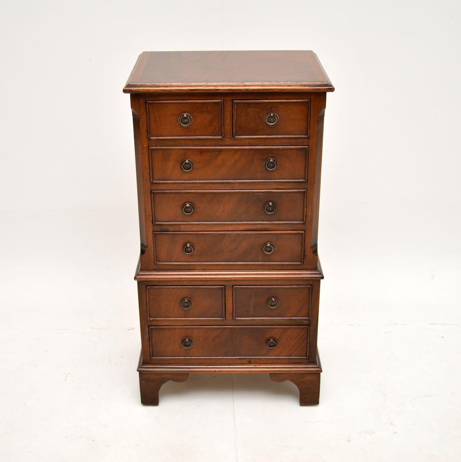 A lovely small antique Georgian style chest of drawers. This was made in England, it dates from around the 1950’s.

This is of superb quality and is a very useful size, this model is often called a glove chest. It is low and narrow, useful as a side