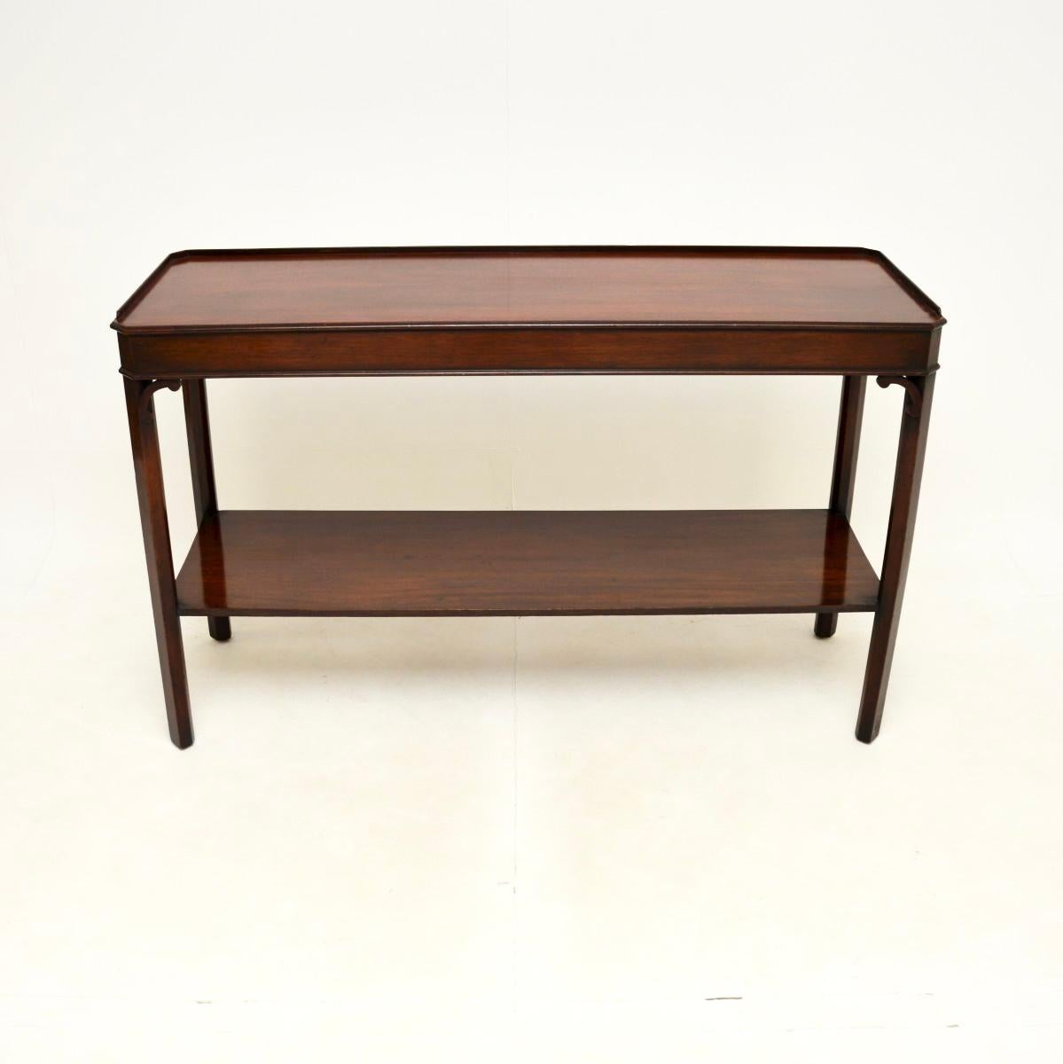 A smart and extremely well made antique Georgian style console table. This was made in England, it dates from around the 1950’s.

The quality is outstanding, this is very sturdy and is a useful size. The second lower tier is a very useful feature,