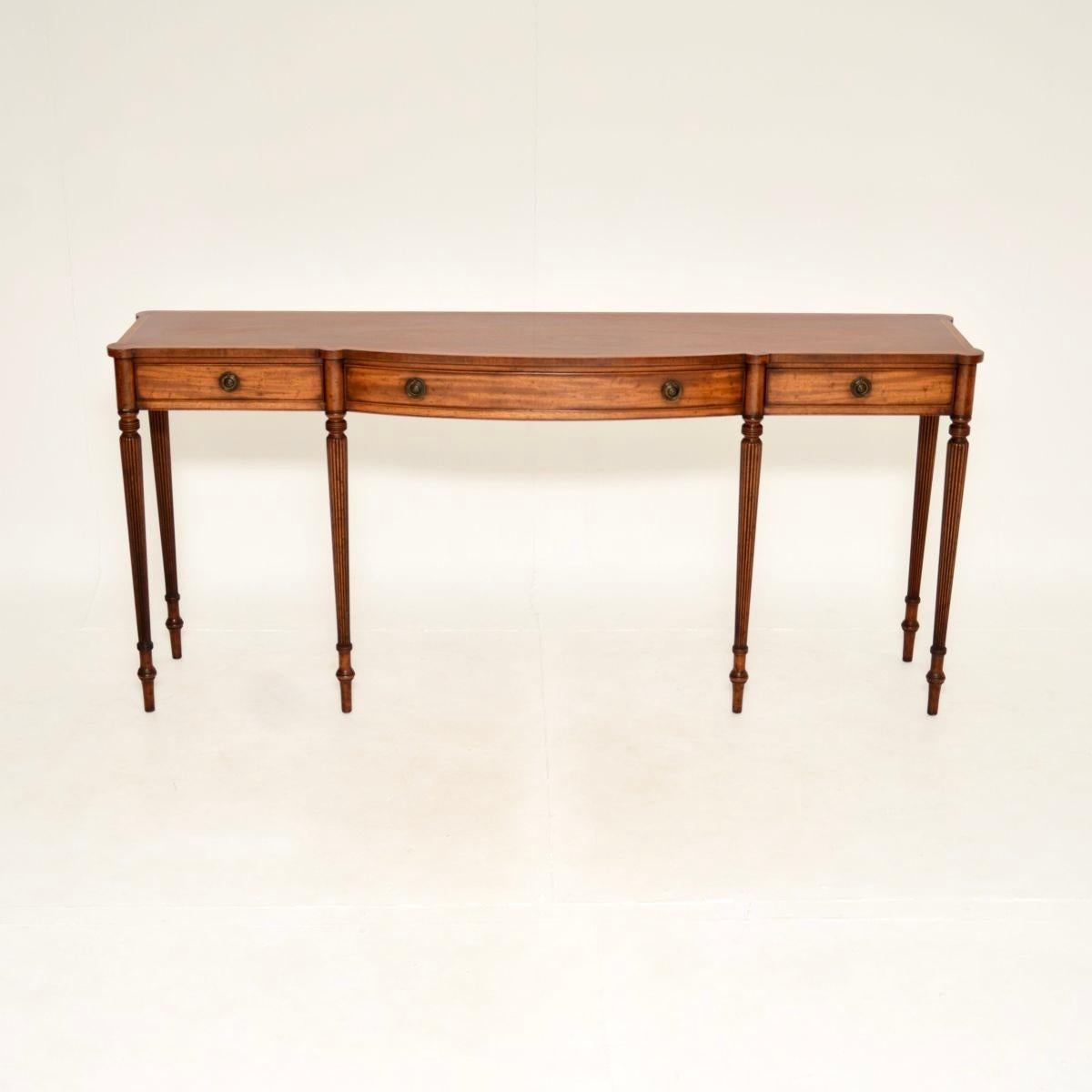 A very impressive and very wide antique Georgian style console table, made in England and dating from around the 1930’s.

This is of beautiful quality and is extremely well made. It is a very useful size, slim from front to back and it is very wide,
