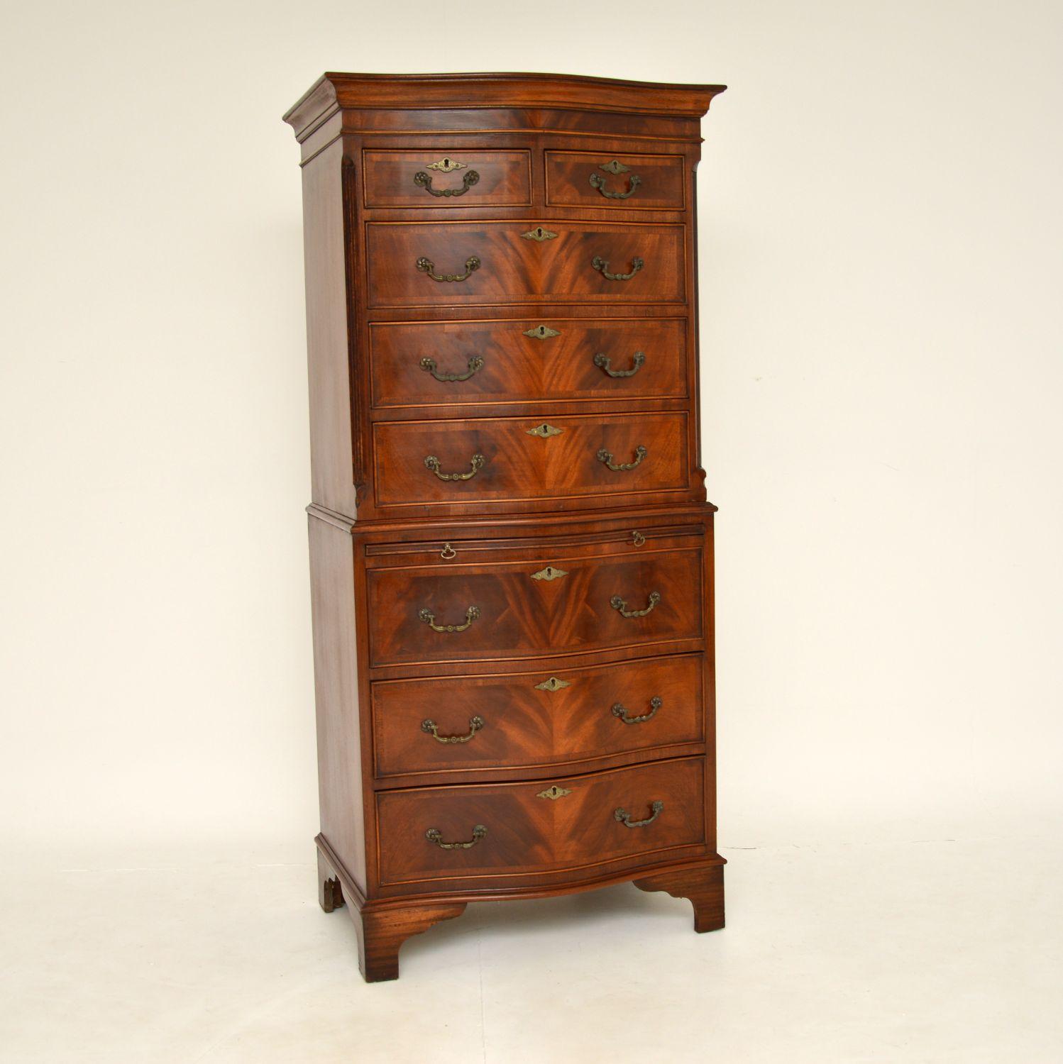 A beautiful antique serpentine fronted chest on chest, made in England & dating from around the 1920-1930’s period.

It is a great size and offers lots of storage space. The wood has a gorgeous colour and lovely grain patterns. The drawers are all