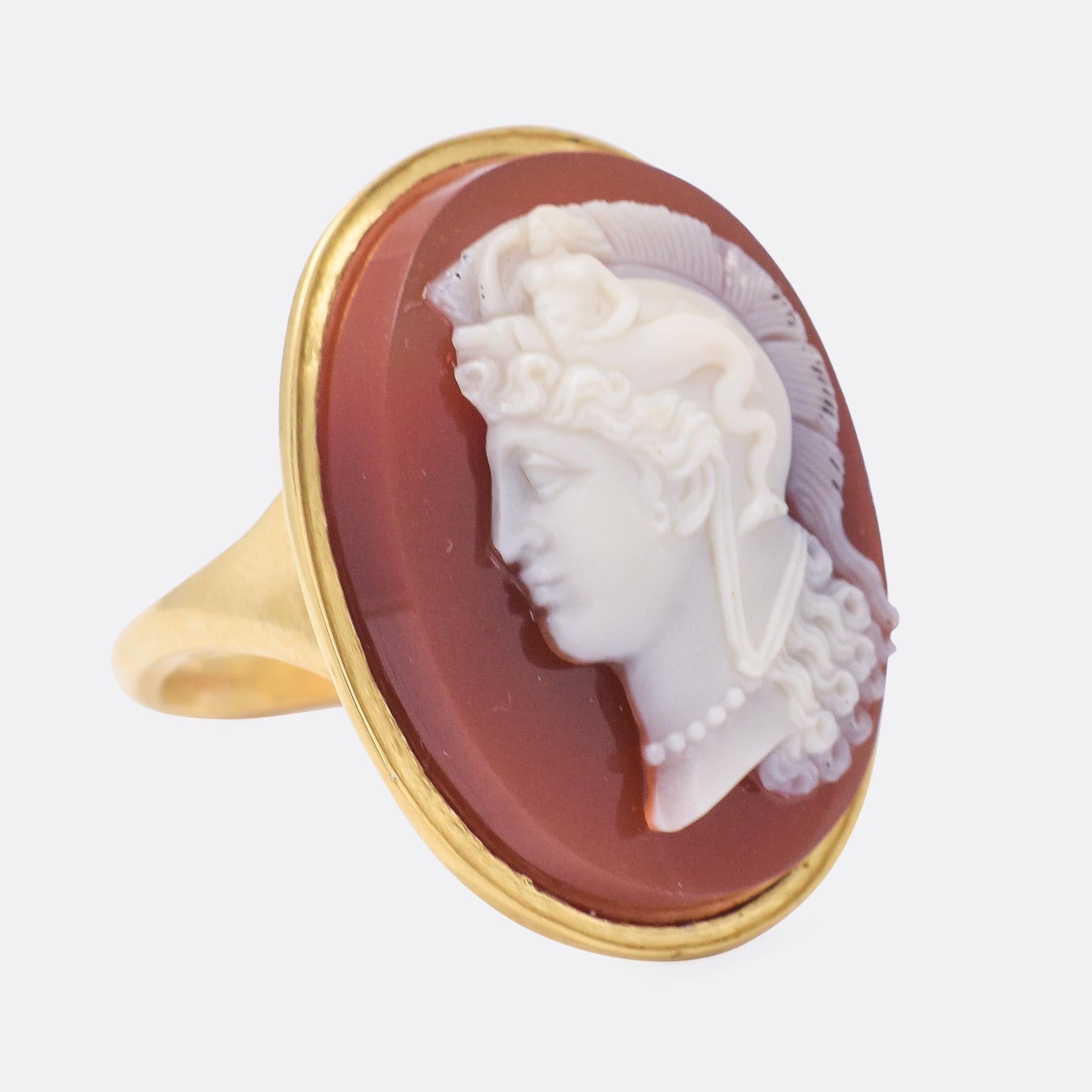 DESCRIPTION

Cameo: Georgian, c.1820

A stunning Georgian sardonyx cameo ring dating from the early 19th Century. We believe the figure depicted is Thessalonike of Macedon, daughter of King Philip II and half-sister of Alexander the Great. She wears