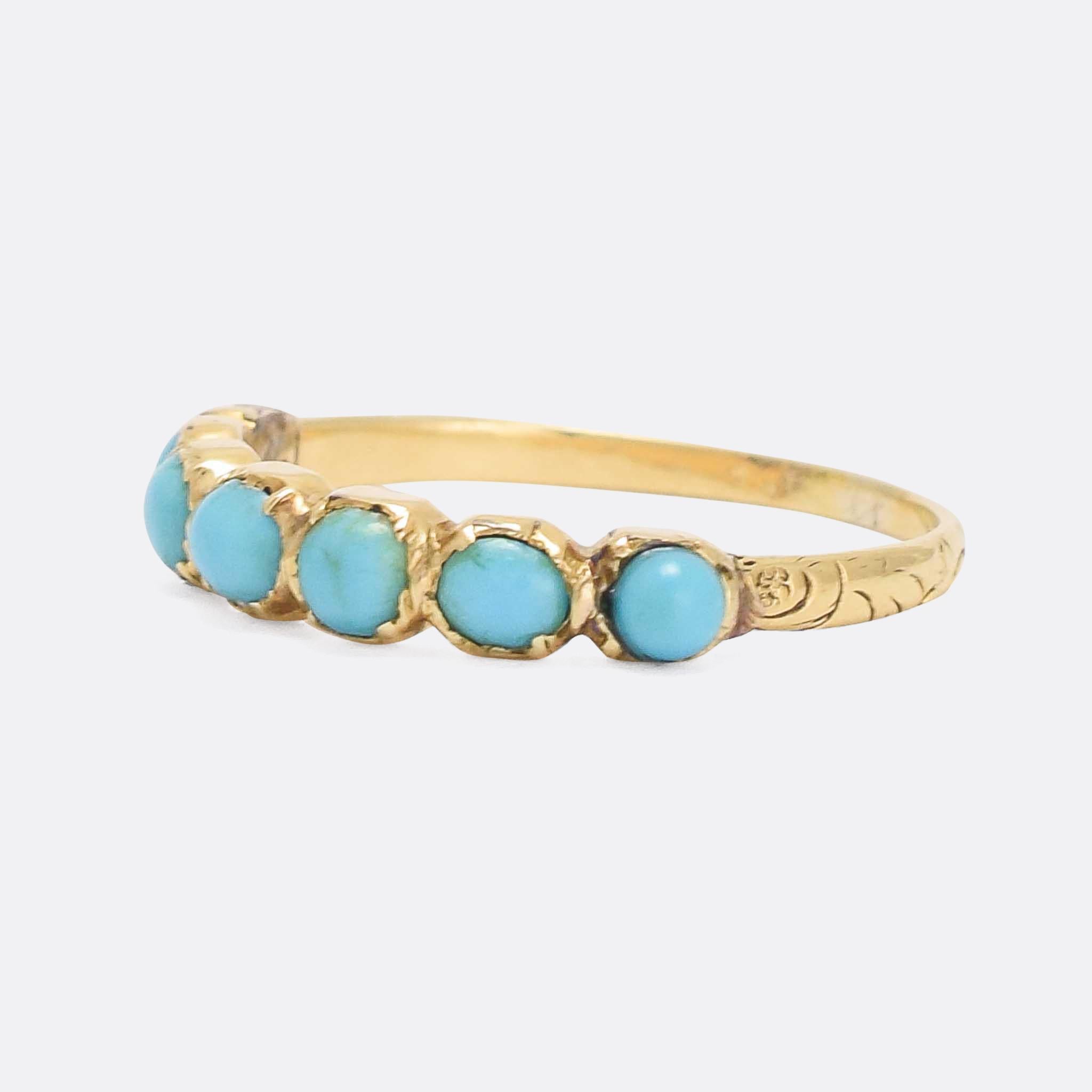 A gorgeous Georgian turquoise half-hoop eternity ring dating from the early 19th Century, circa 1820. The stones are vivid and remain in great condition, and the band has pretty foliate detailing to the shoulders. Modelled in 15k gold.

STONES