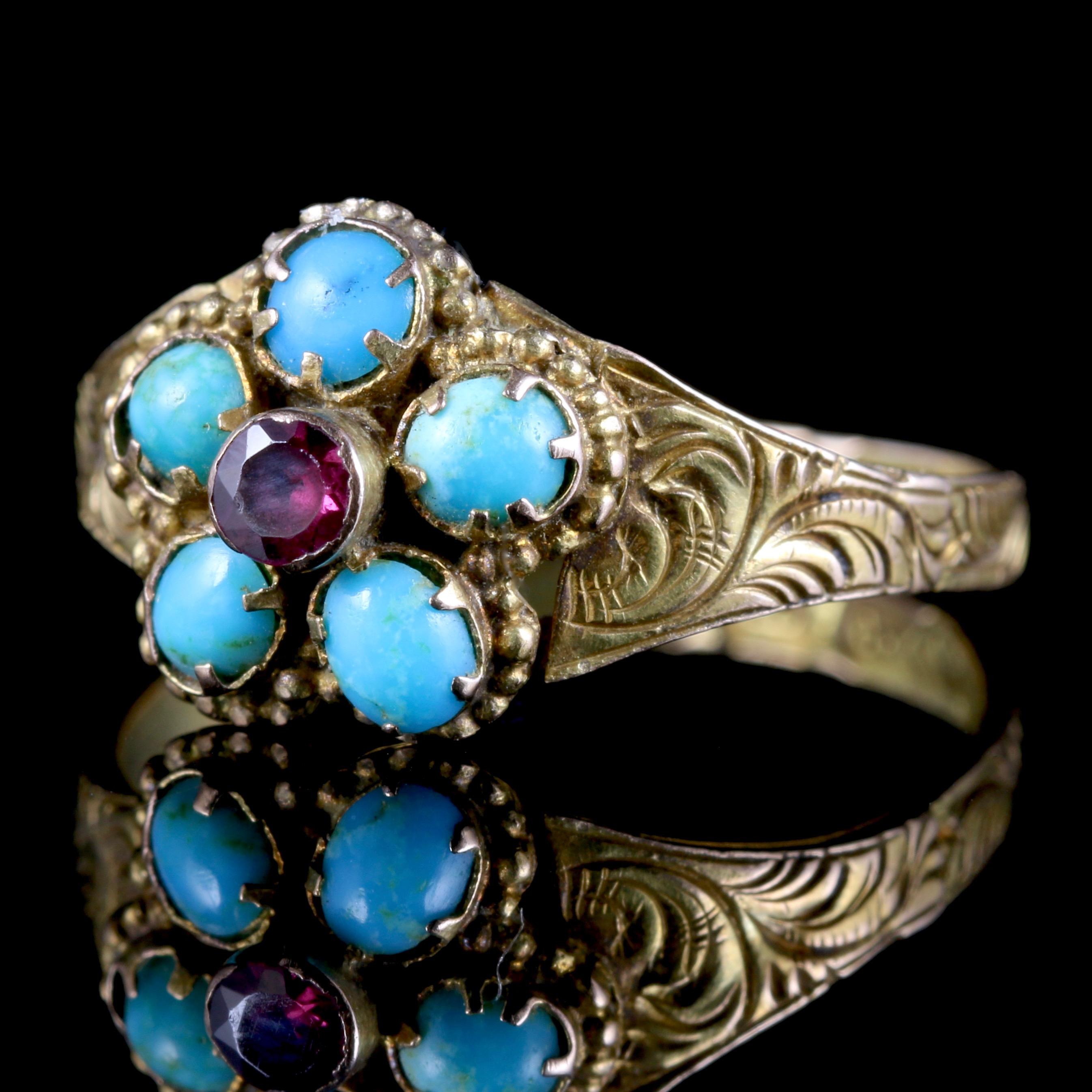 This beautiful Antique Georgian Turquoise and Ruby ring is set in 12ct Gold, Circa 1800.

The ring has a bright cluster of Turquoise's in the shape of a flower with a Ruby in the centre.

Turquoise is known to have healing properties and protects