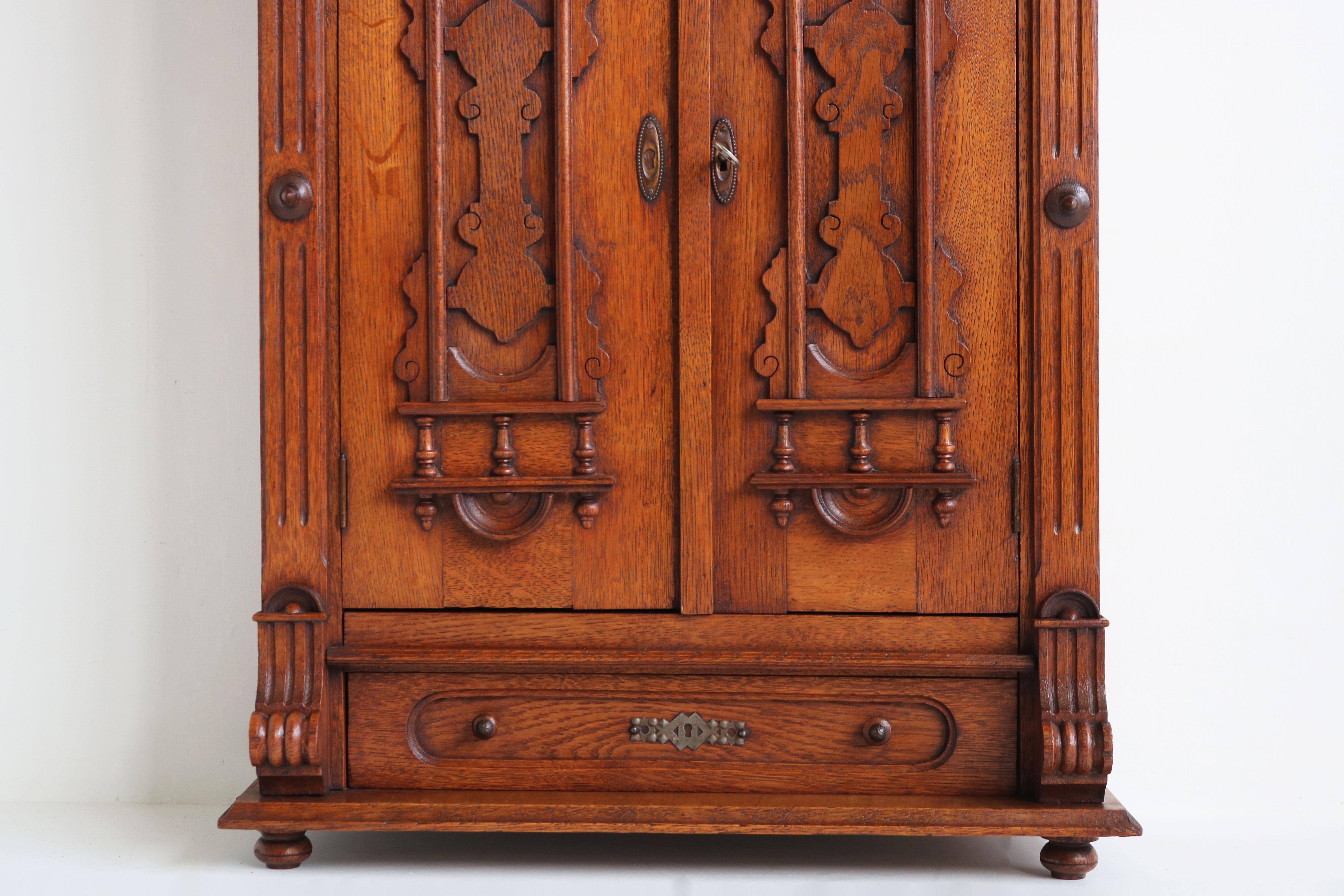 Carved Antique German 19th Century Gründerzeit Wall Cabinet Neo Classical Oak Drawer For Sale