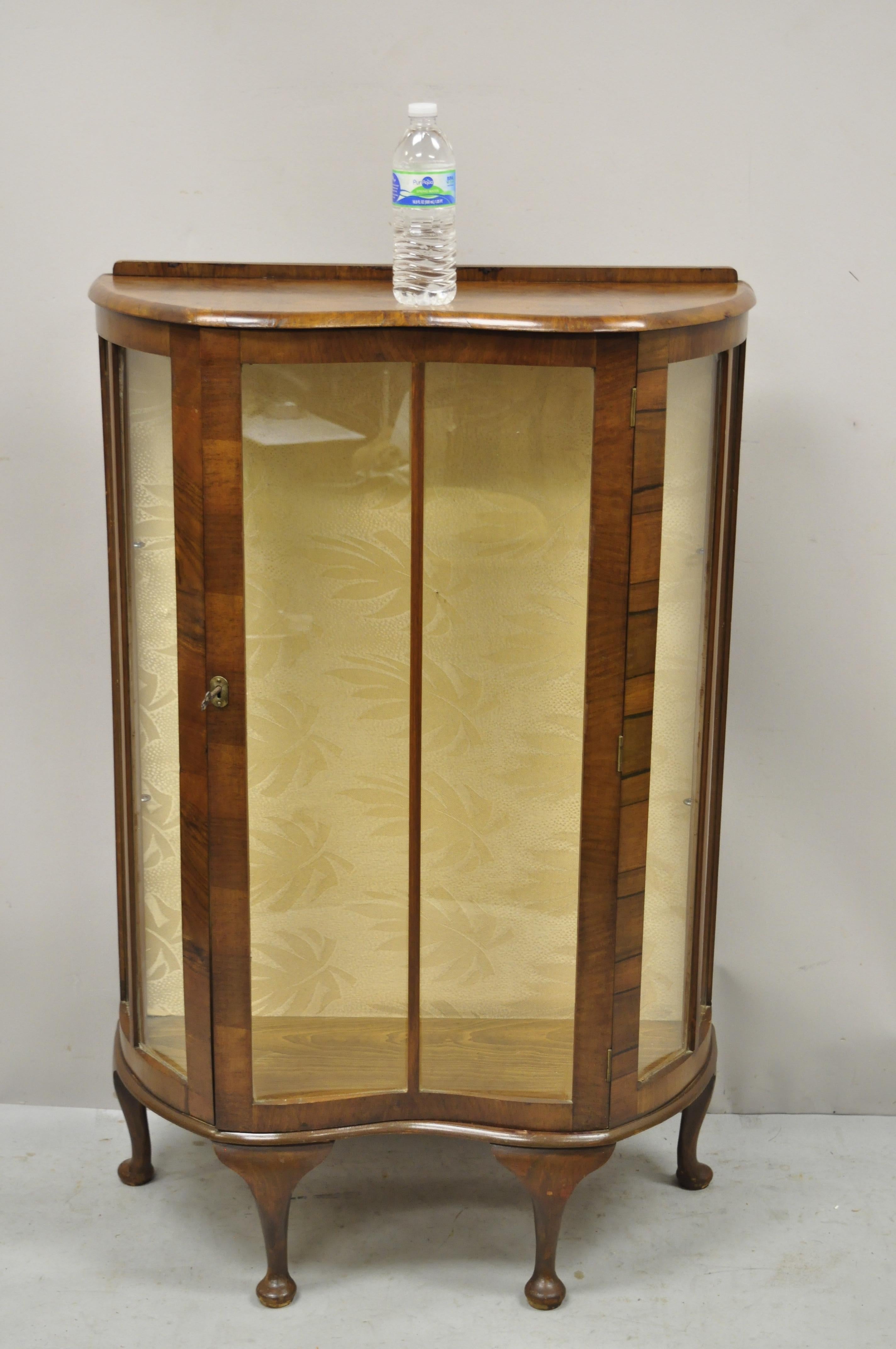 Antique German Art Deco burl walnut zebra wood small glass curio display cabinet. Item features beautiful wood grain, working lock and key, shapely Queen Anne legs, very nice antique item, great style and form. Circa early 1900s. Measurements: 44.5