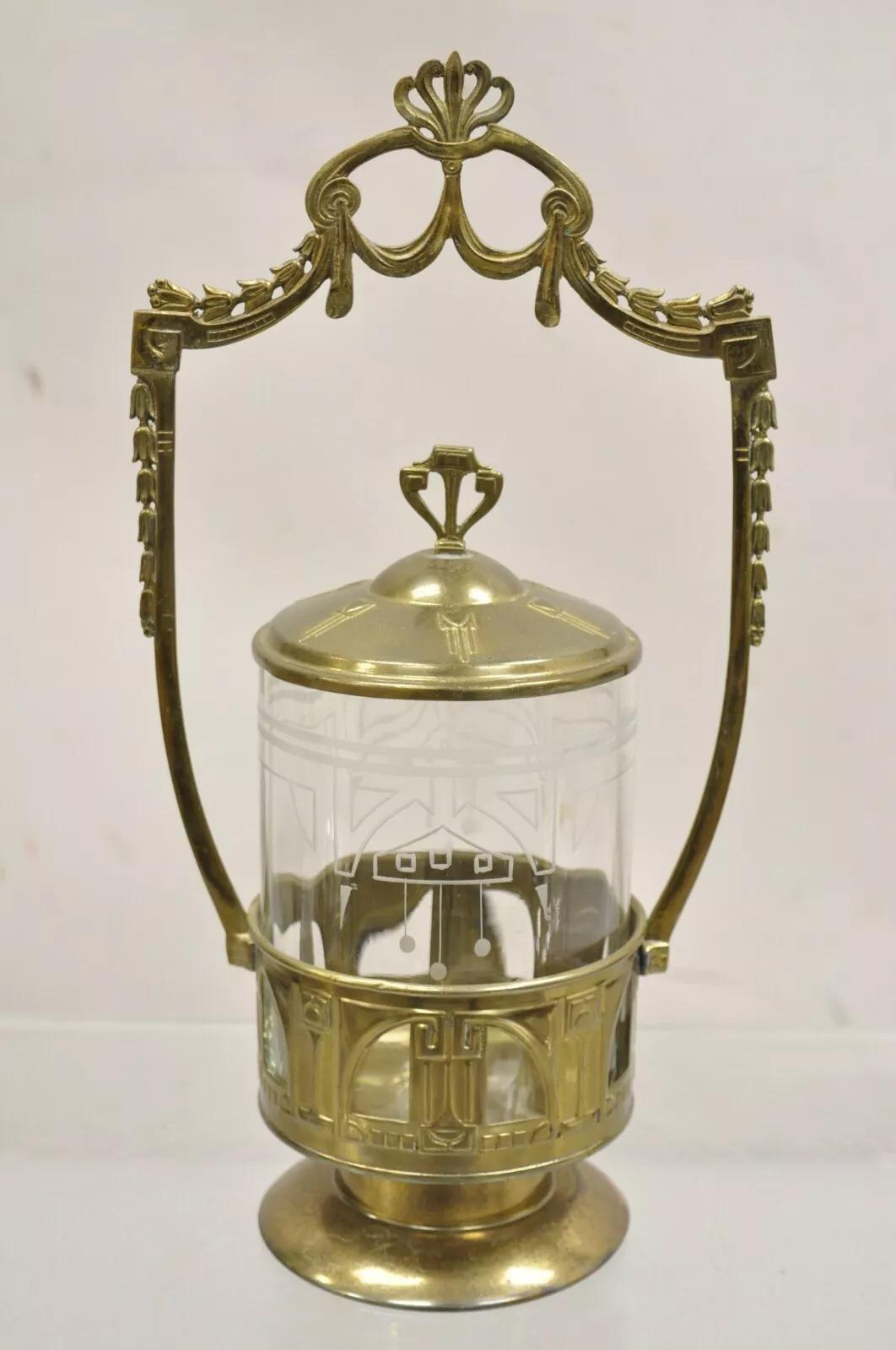 Ancienne roulette à picots en métal, en laiton et en verre gravé. Circa Early 20th Century. Dimensions : 14