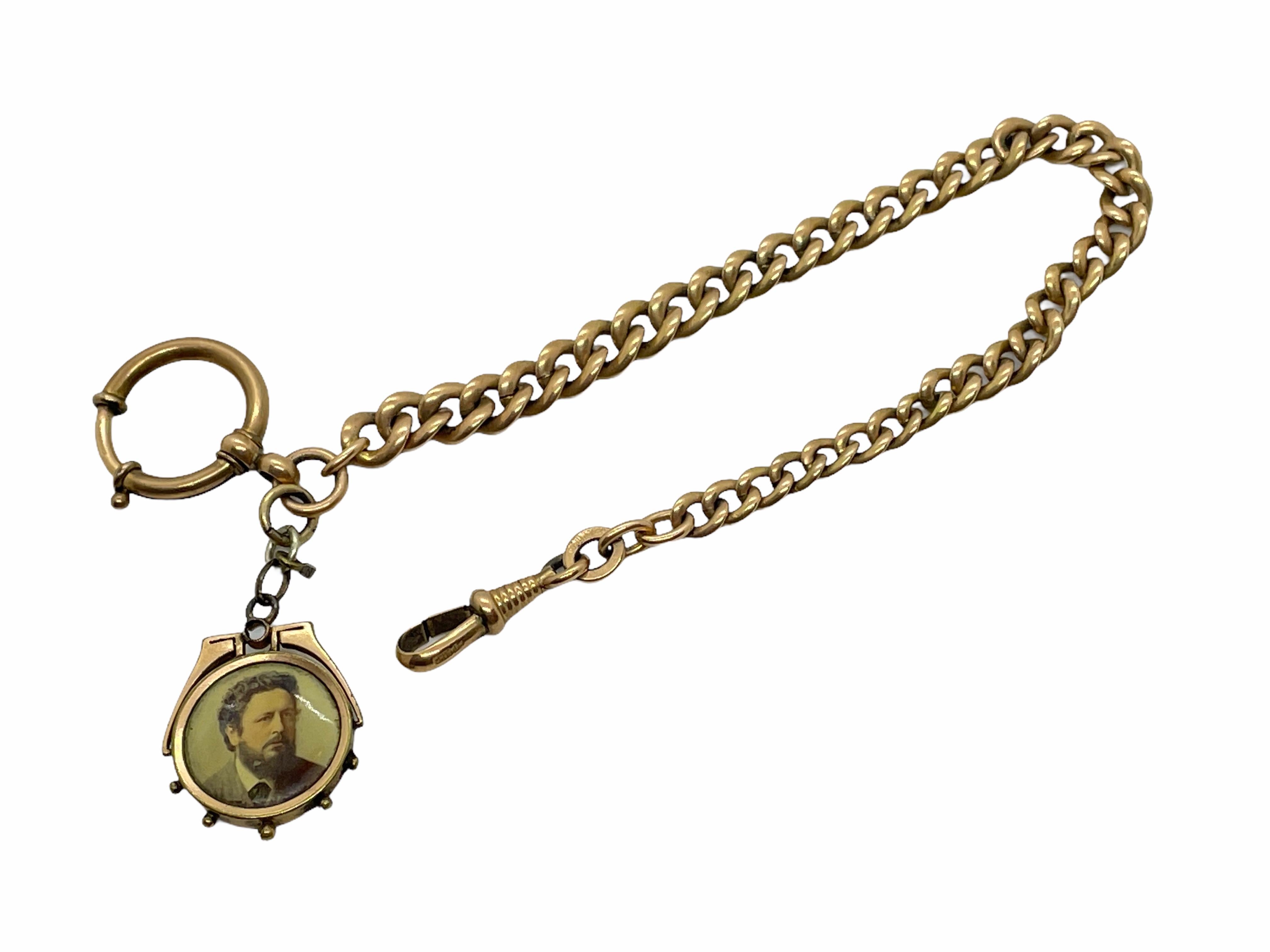 This lovely pocket watch chain with sentimental FOB, pendant with a picture of a loved one, is still a beauty. It is circa 1900s or older. 
A very pretty antique jewellery item which would make a fine addition to any collection.