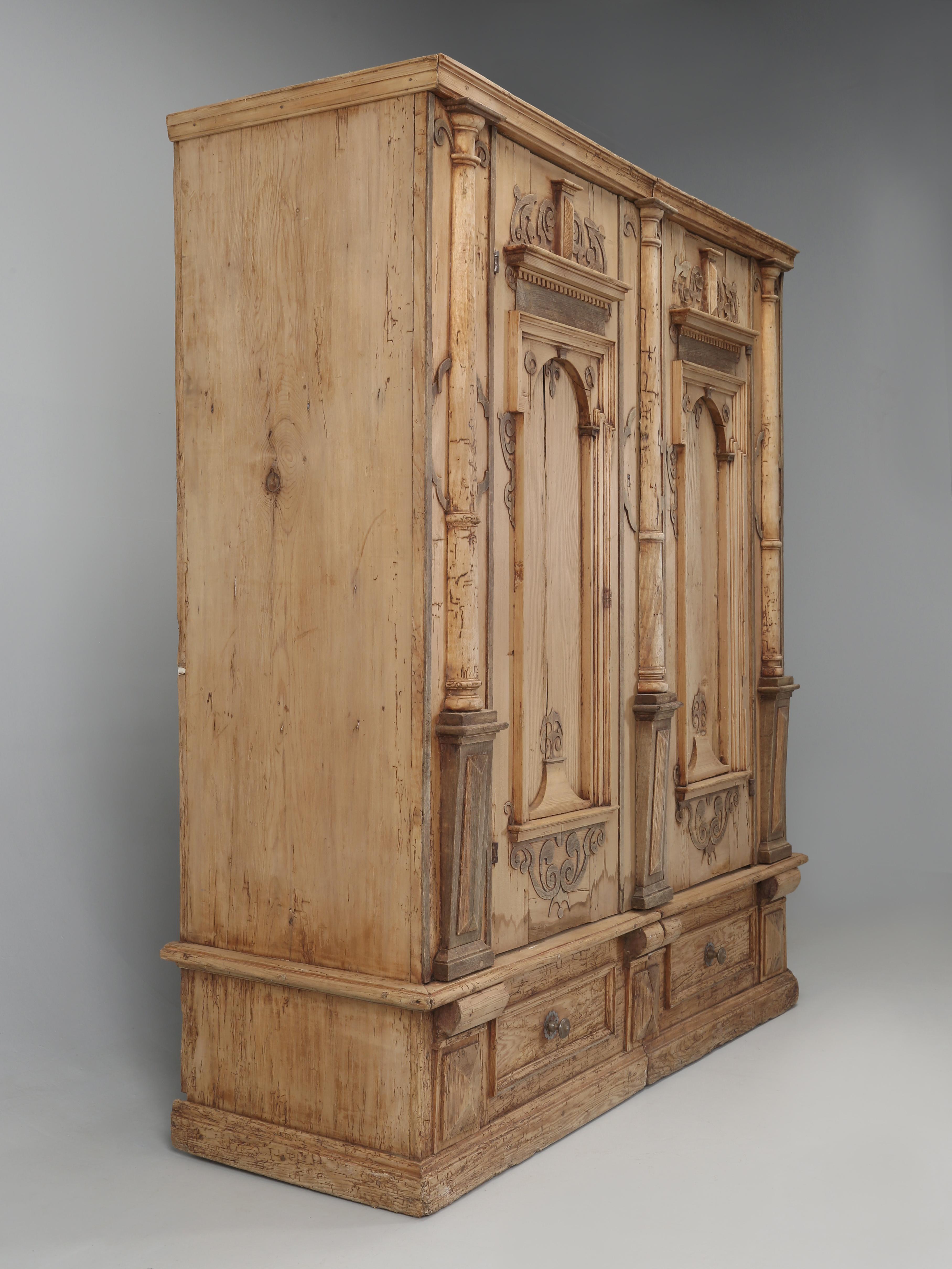 Hand-Carved Antique German Baroque Armoire or Cabinet in Stripped Pine Made in the 1700's For Sale