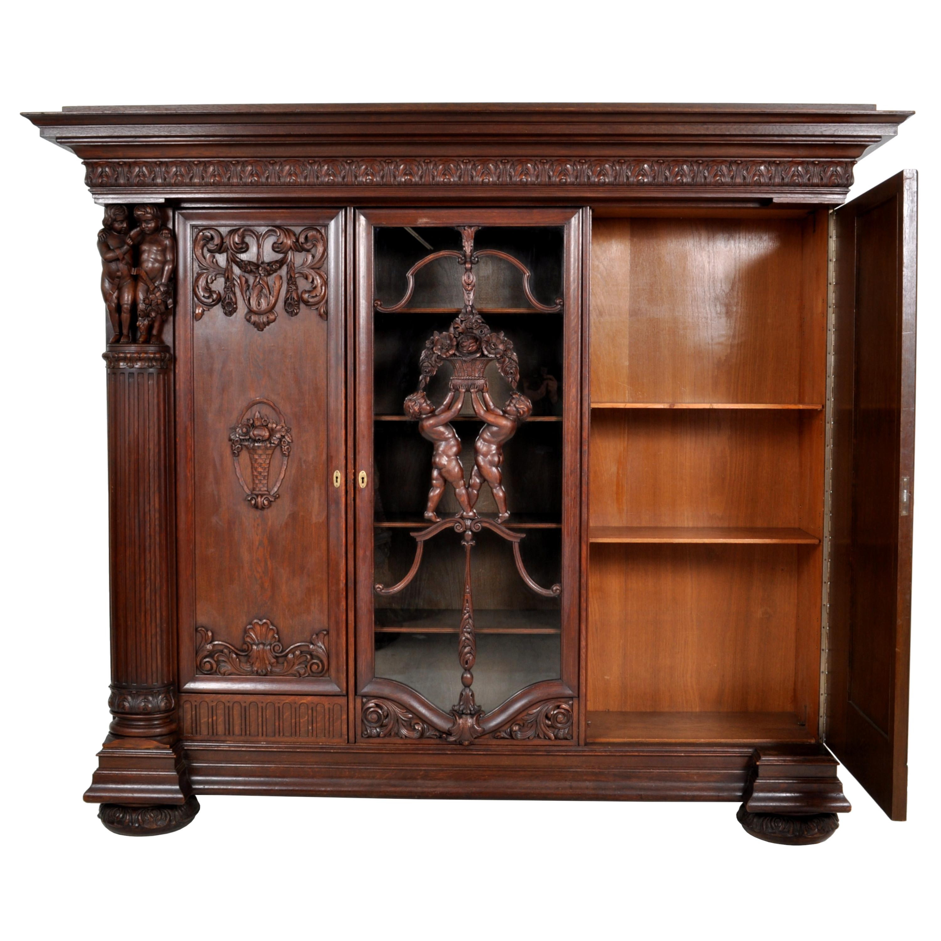 Antique German Baroque Revival Carved Oak Bookcase Bibliotheque Library Cabinet In Good Condition In Portland, OR