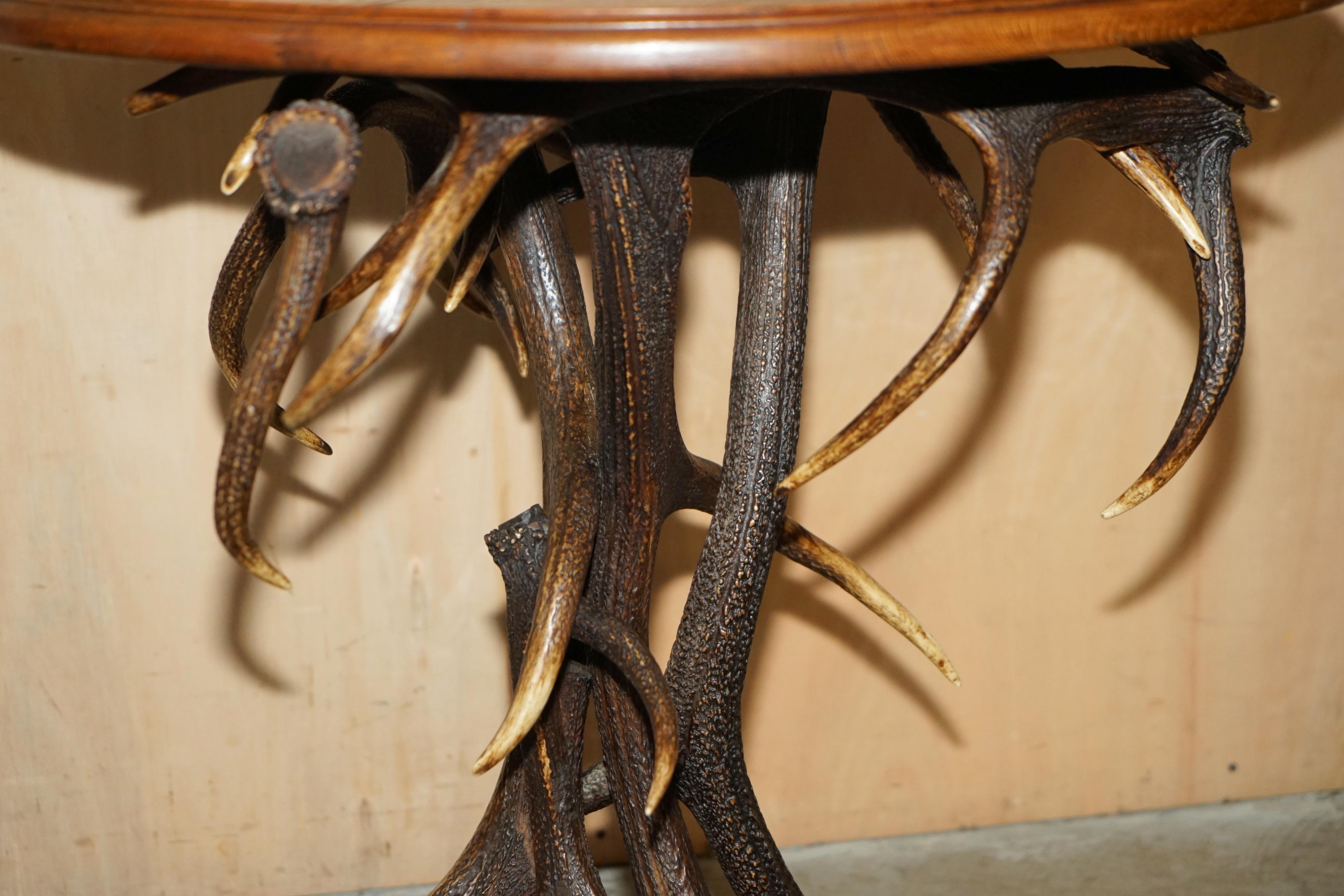 Hand-Crafted ANTiQUE GERMAN BLACK FOREST CARVED RAMS HEAD ANTLER SUPPER TABLE PART OF A SUITE For Sale