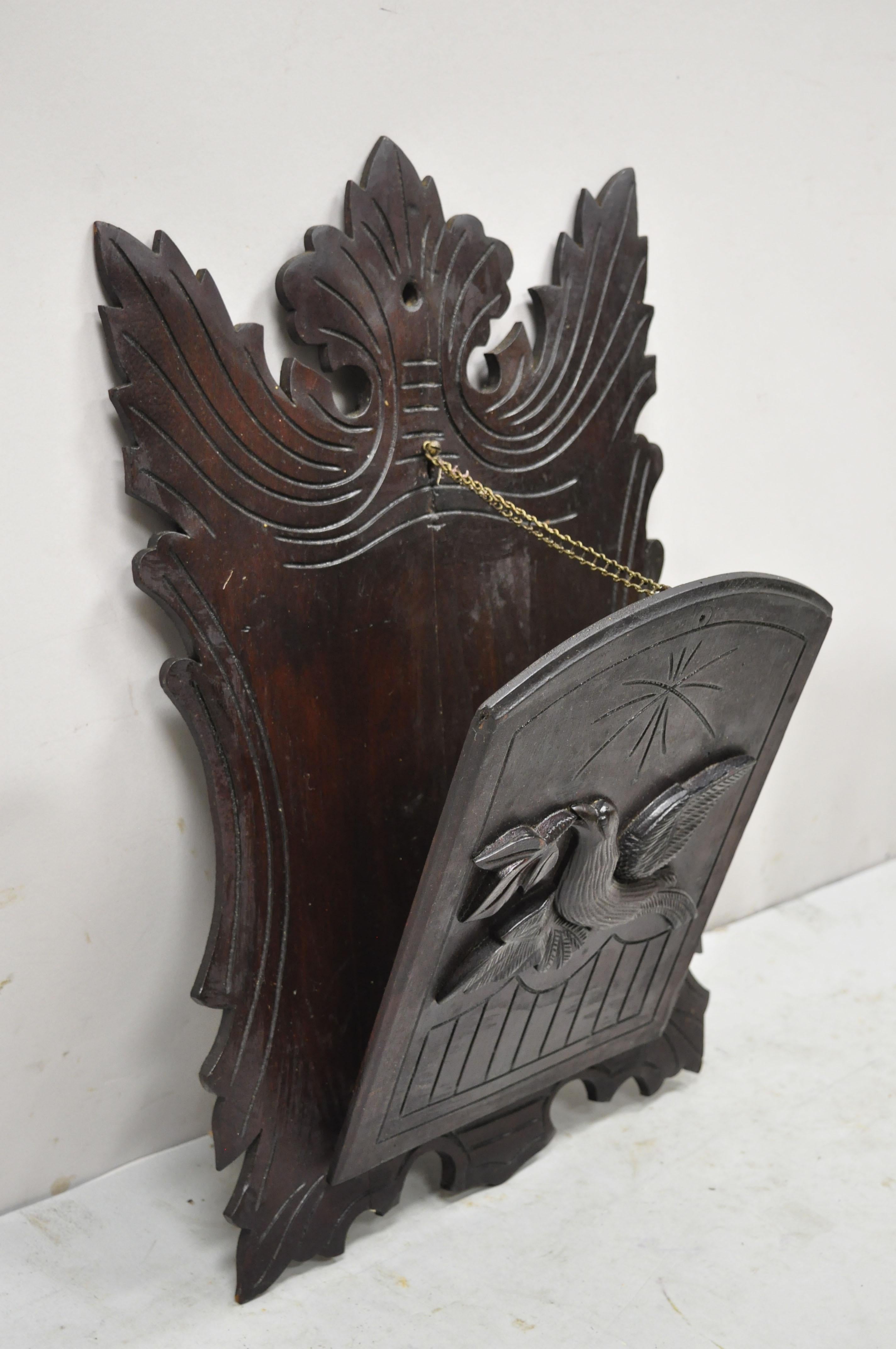 Antique German black forest carved walnut bird wall pocket letter holder. Item features solid wood construction, beautiful wood grain, nicely carved details, very nice antique item, quality American craftsmanship, great style and form. Circa Early