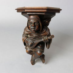 Antique German Black Forest Carved Walnut Monk Musician Shelf, circa 1900
