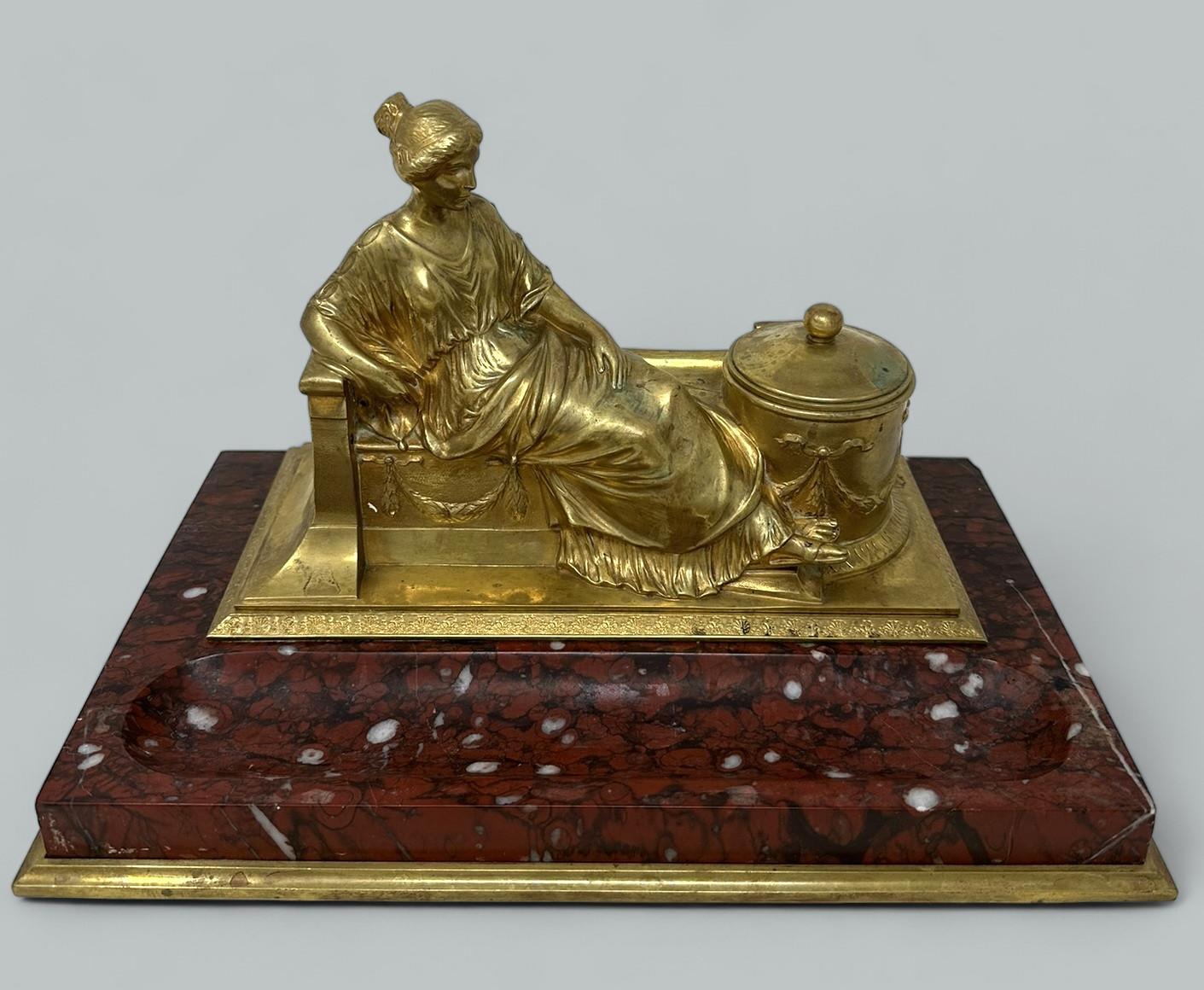 Stunning Chisel Cast Austrian or German Neo-Classical Ormolu and Rosso Antico Marble Ink Stand of Museum Quality and generous proportions, by George Josef Burgstaller, Late Nineteenth Century. 

Depicting an elegant classical seated Lady in period