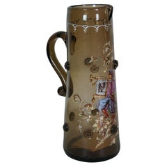 Antigua jarra de agua heráldica alemana de vidrio marrón esmaltado Hobnail 13
