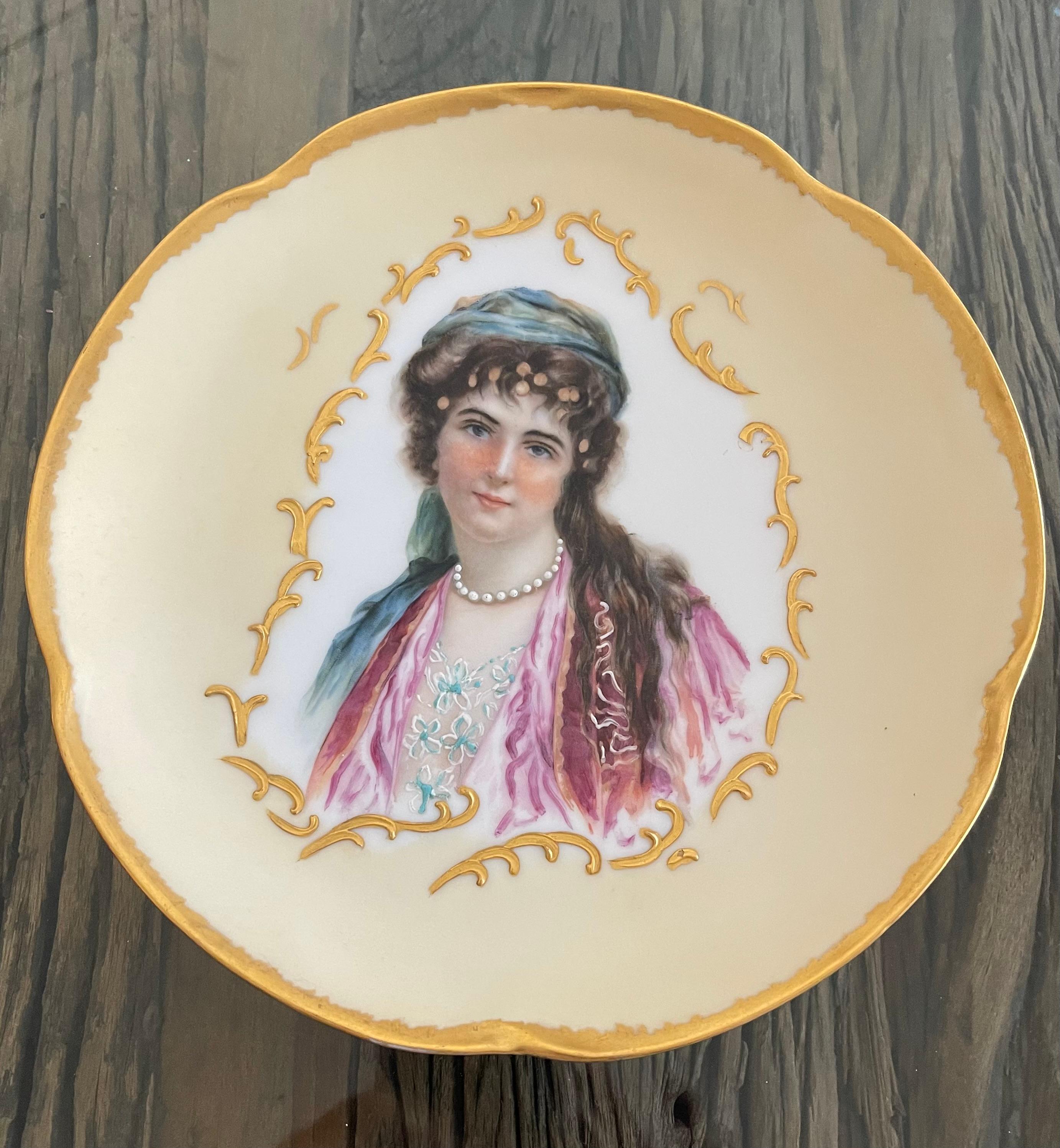 Antique German cabinet portrait porcelain plate of a young win a gypsy dress, Handpainted. 