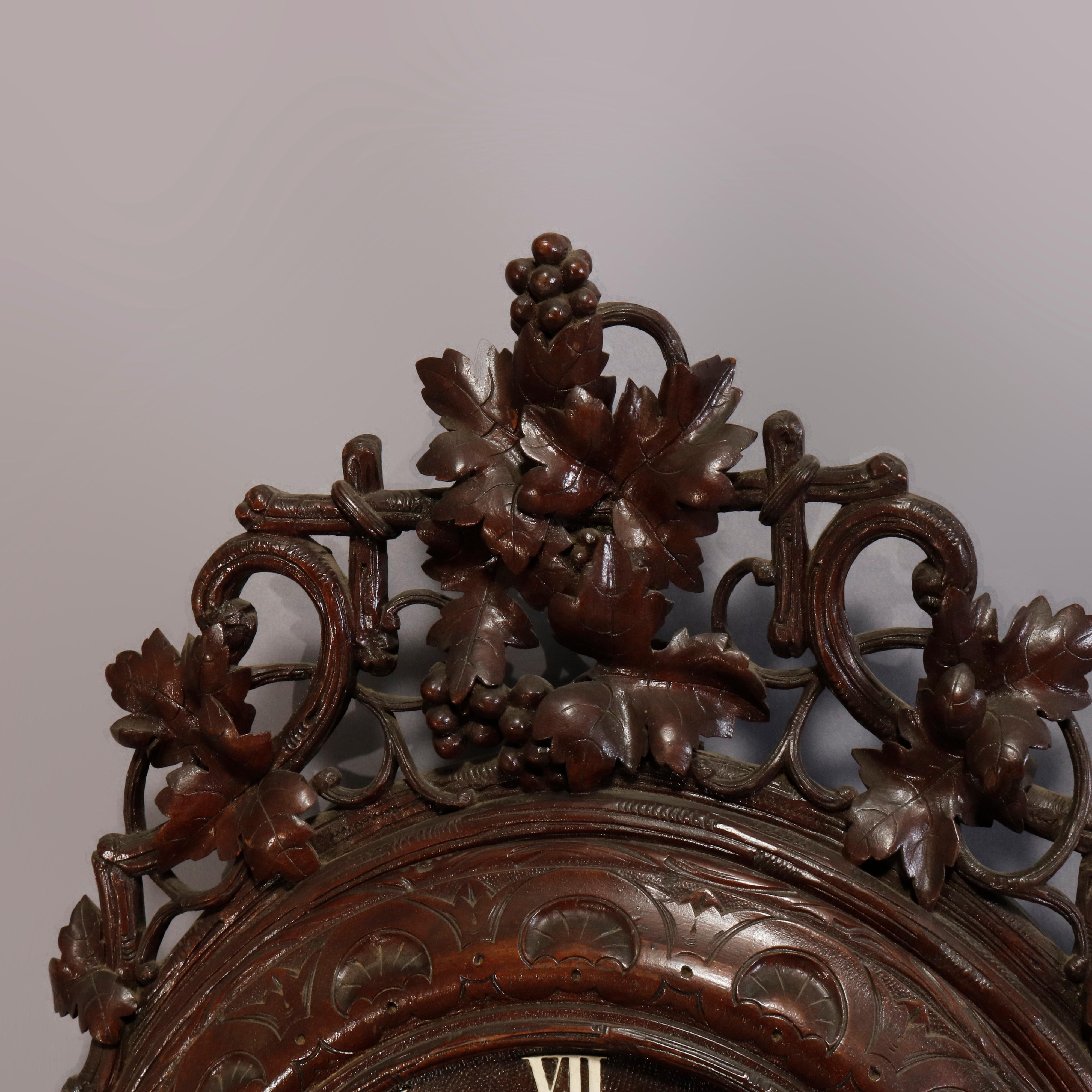 Victorian Antique German Carved Black Forest Grape and Vine Wall Clock, circa 1890
