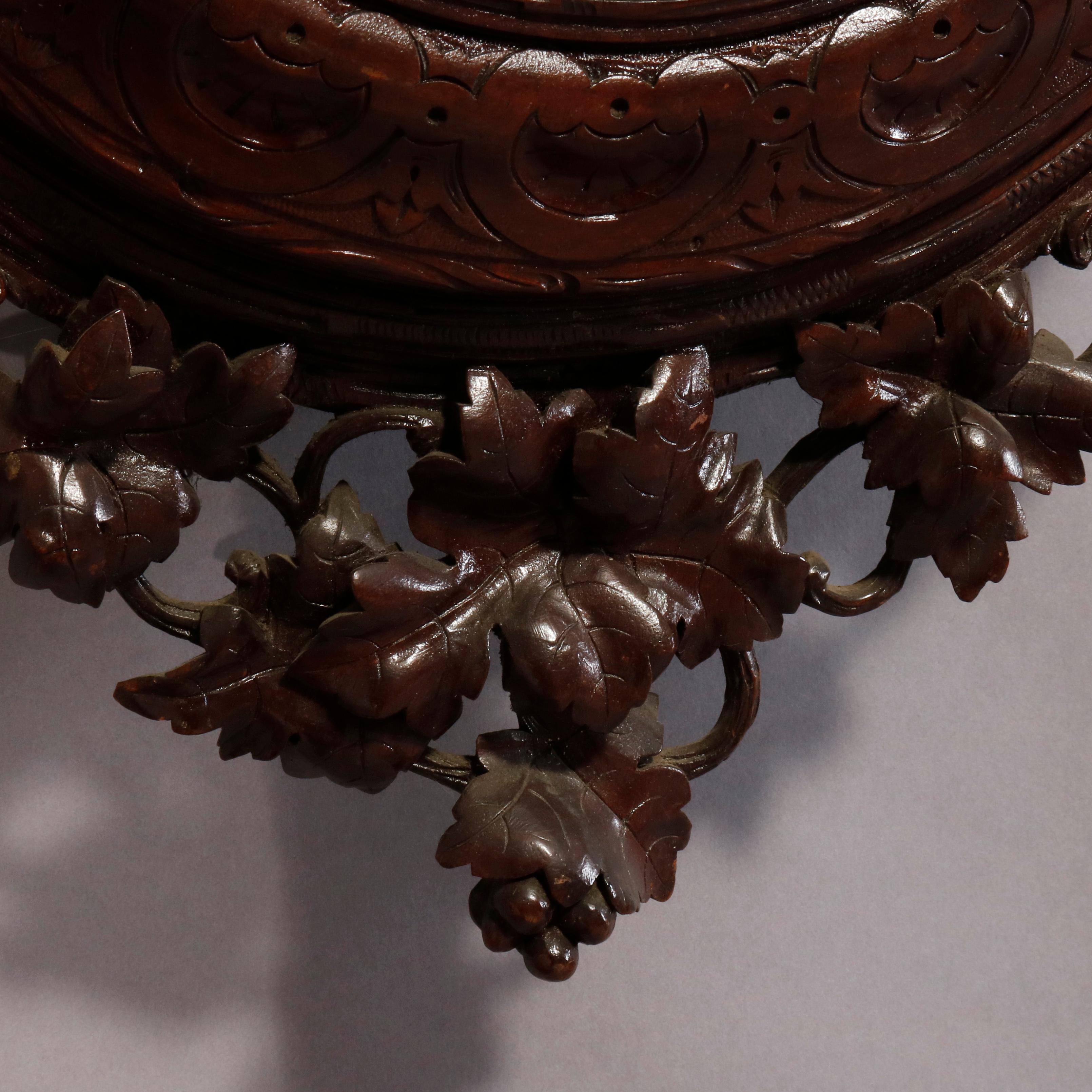 Glass Antique German Carved Black Forest Grape and Vine Wall Clock, circa 1890