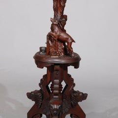 German Carved Walnut Figural Black Forest Marble-Top Plant Stand, circa 1880