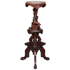 German Carved Walnut Figural Black Forest Marble-Top Plant Stand, circa 1880
