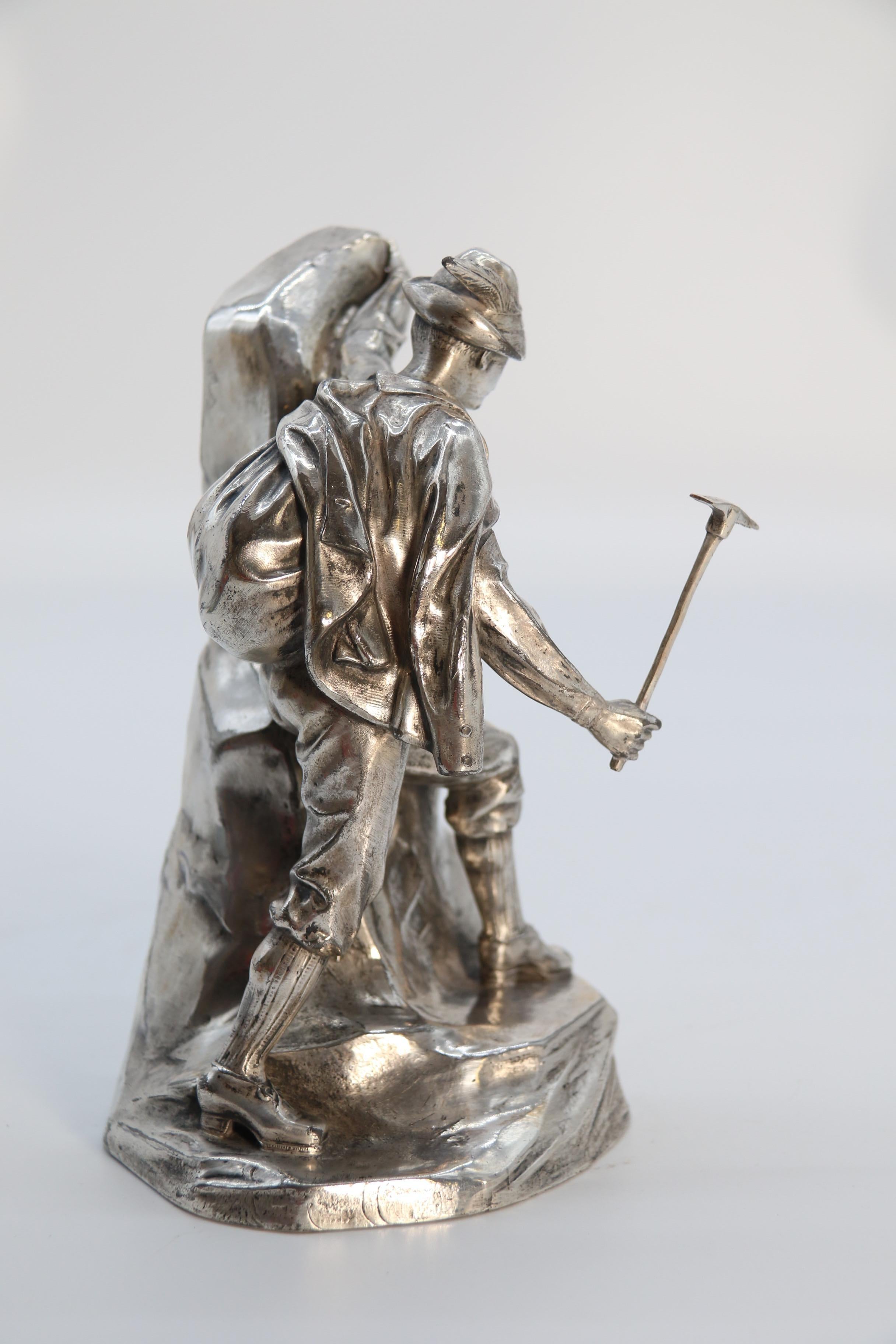 Antique German cast metal and silver plated sculpture of a mountaineer C 1910 3