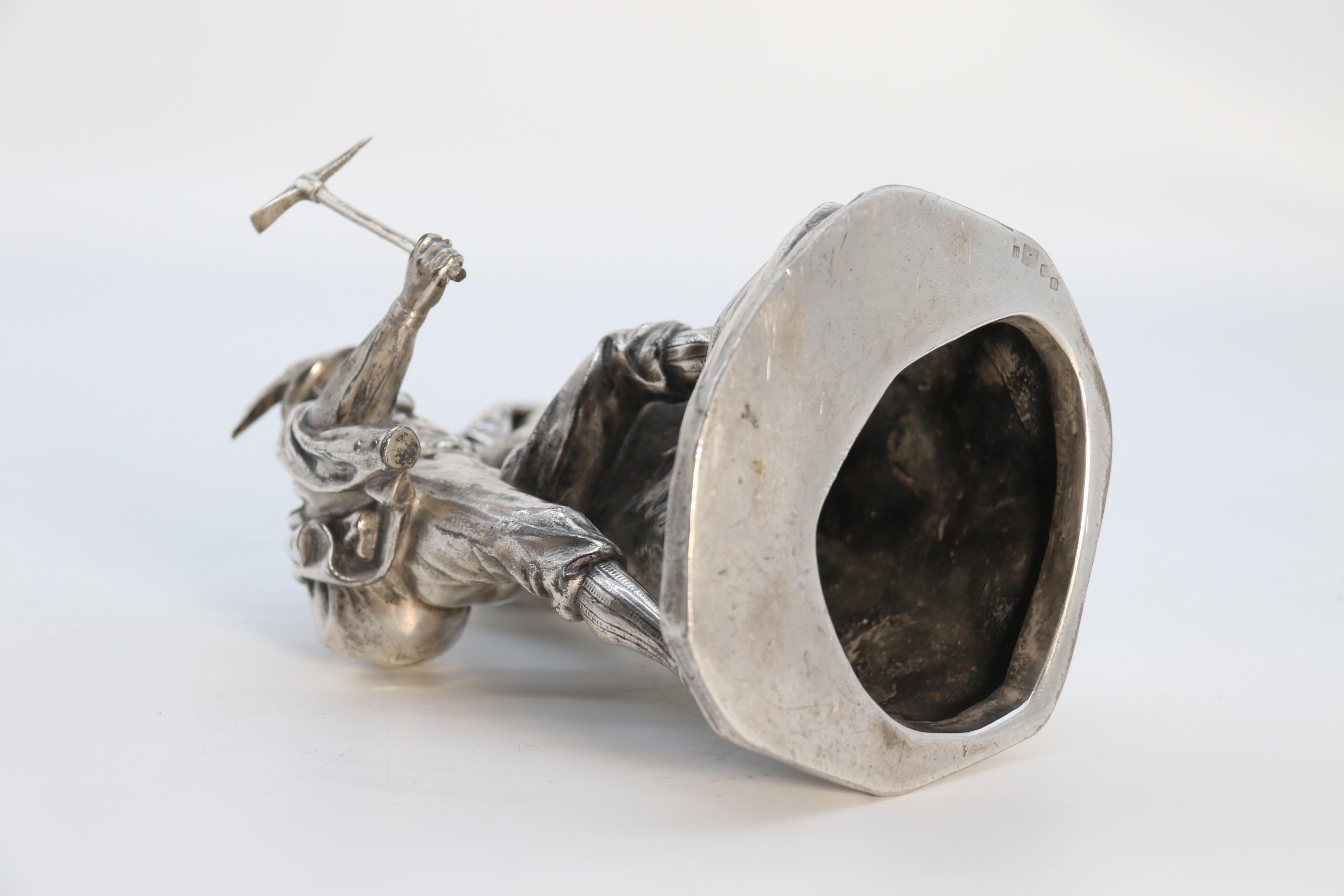 Antique German cast metal and silver plated sculpture of a mountaineer C 1910 10