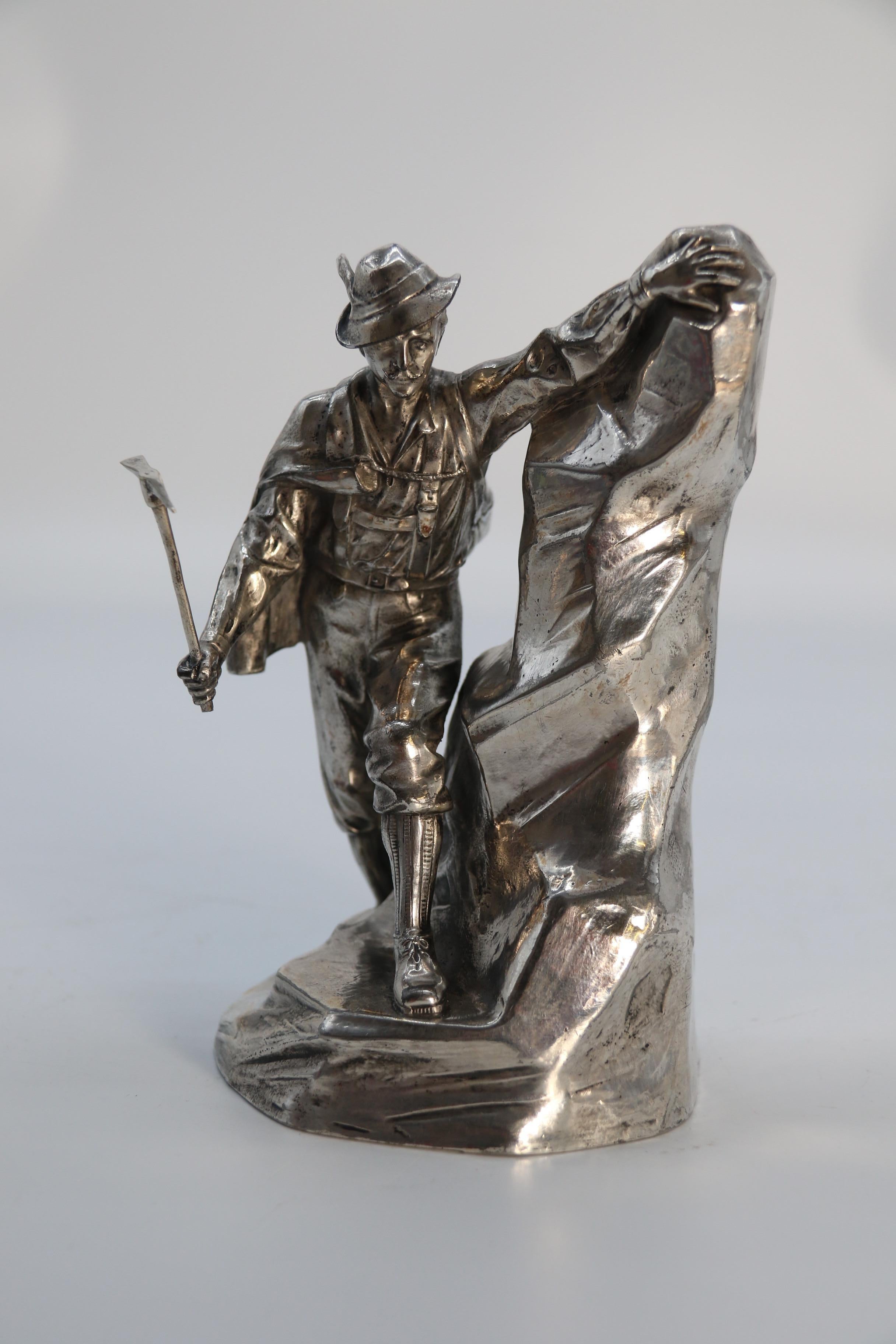 Edwardian Antique German cast metal and silver plated sculpture of a mountaineer C 1910