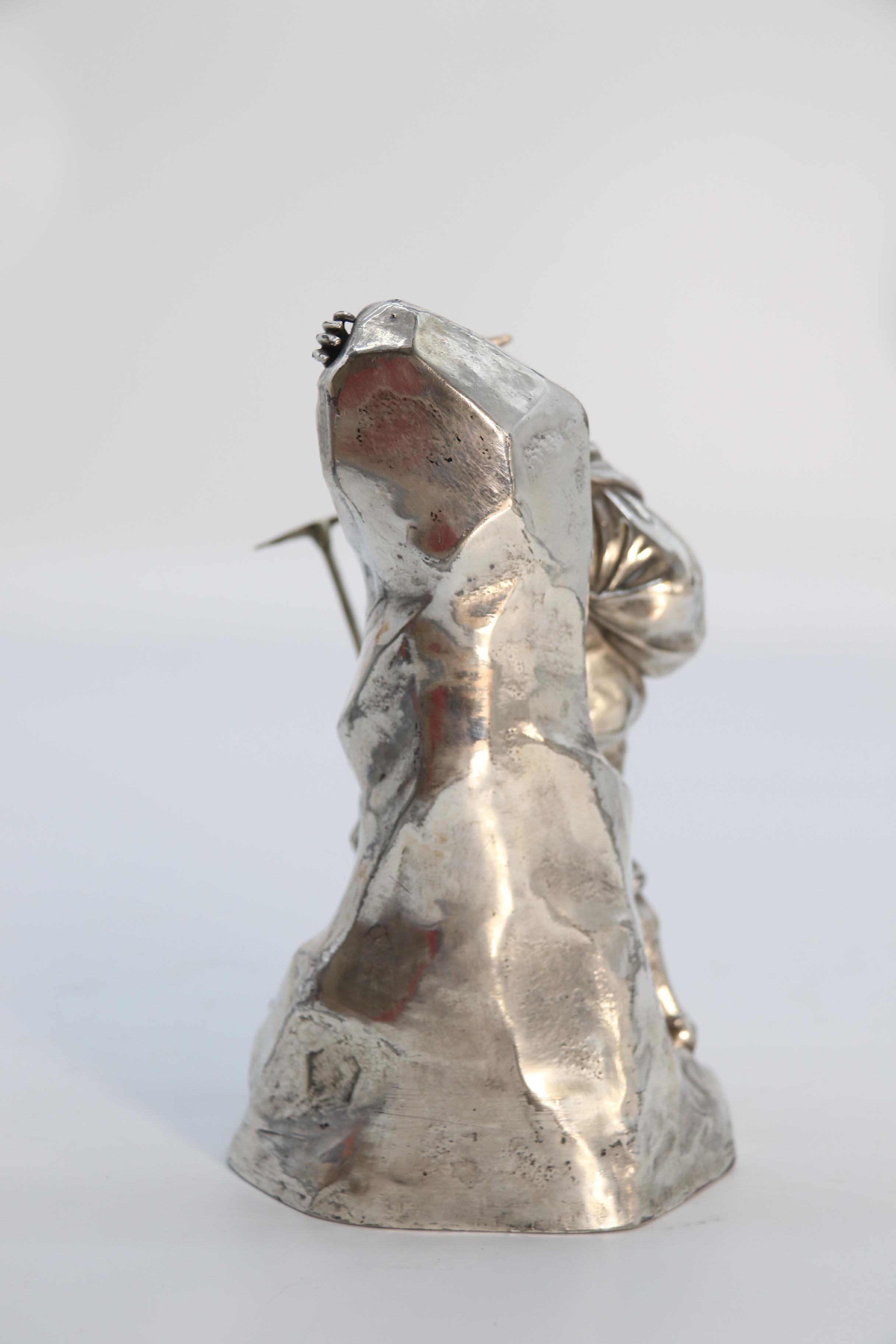 20th Century Antique German cast metal and silver plated sculpture of a mountaineer C 1910