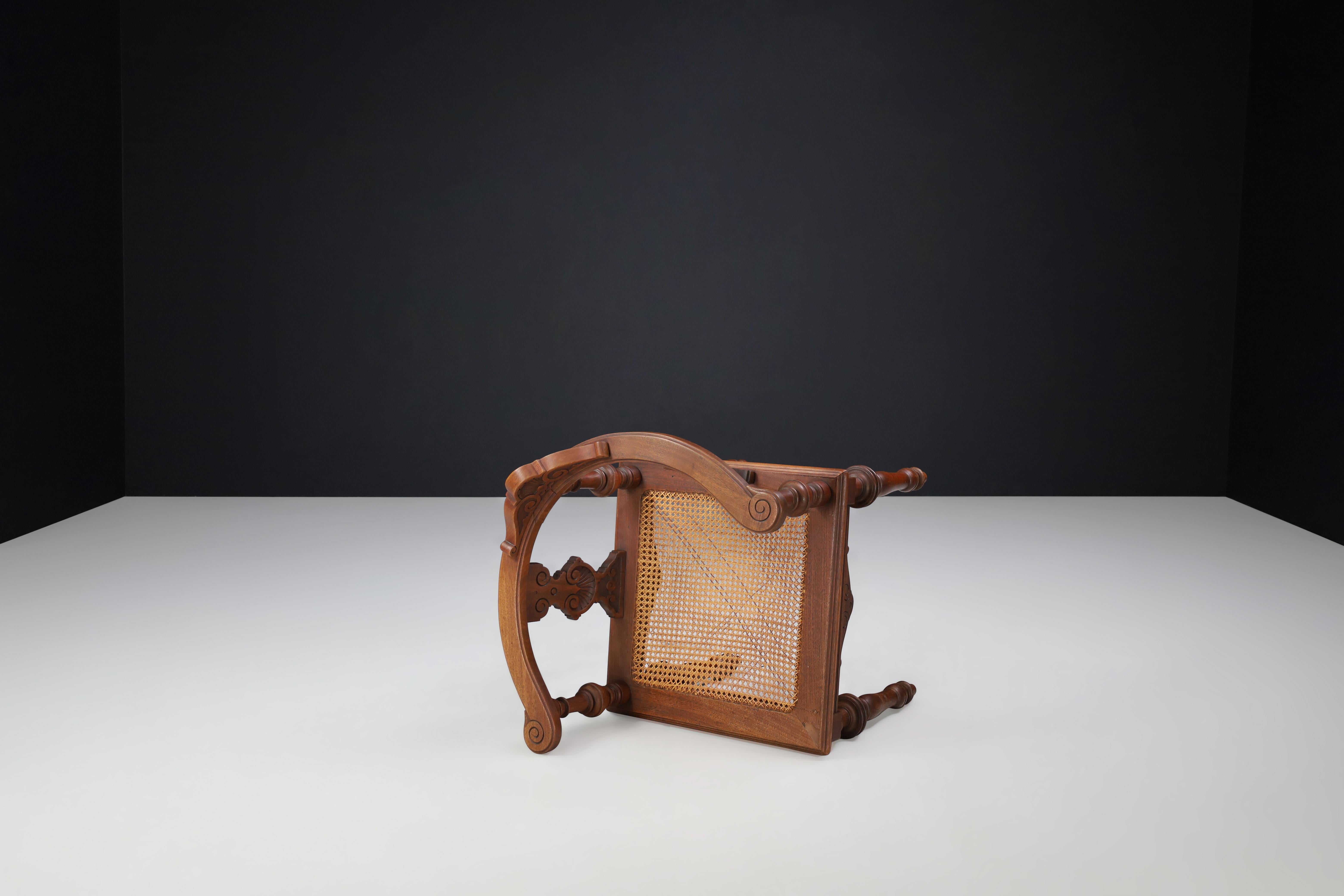 Late 19th Century Antique German Corner Chair, Circa 1880 – Hand-Carved Walnut with Cane Seat For Sale