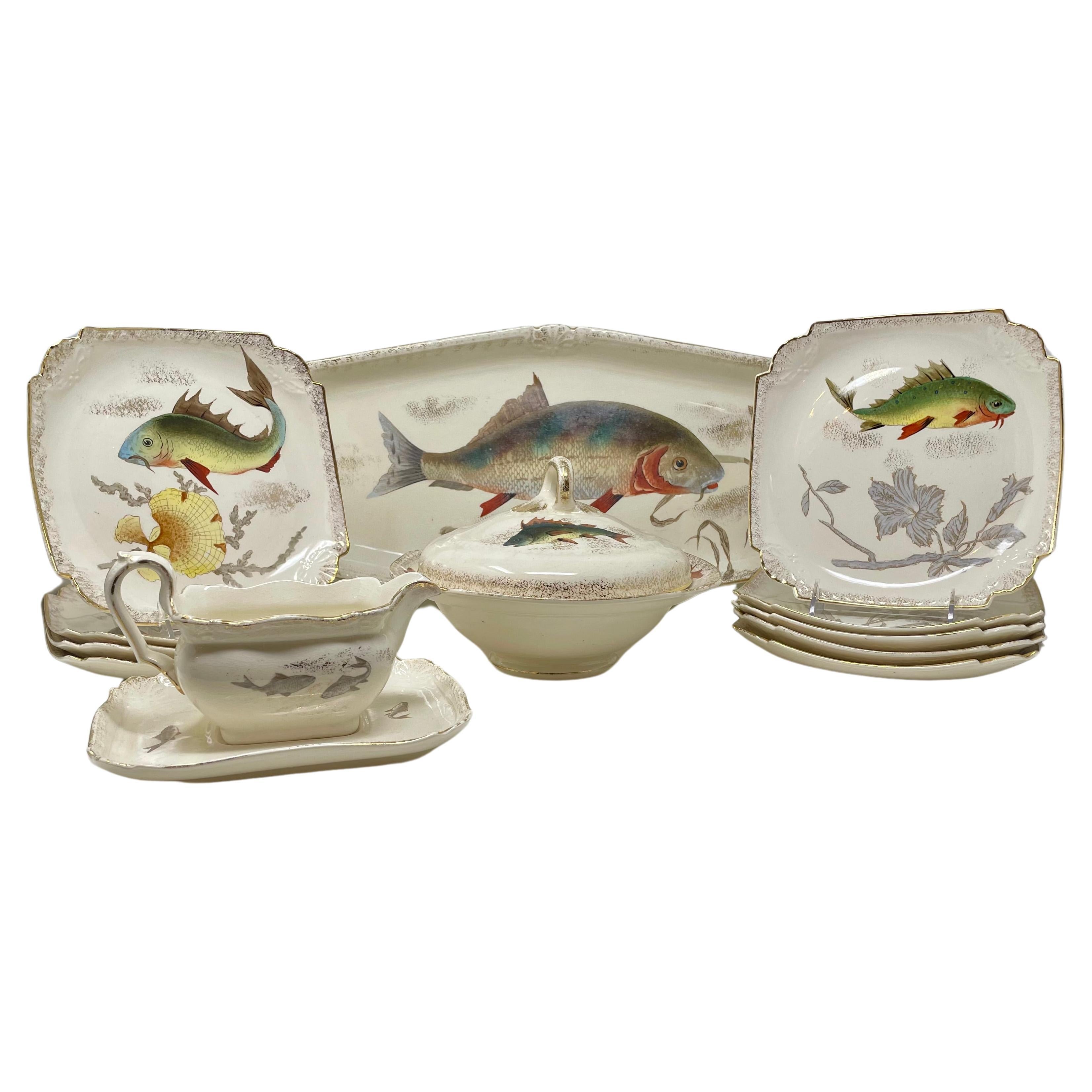 Antique German earthenware fish set, signed 