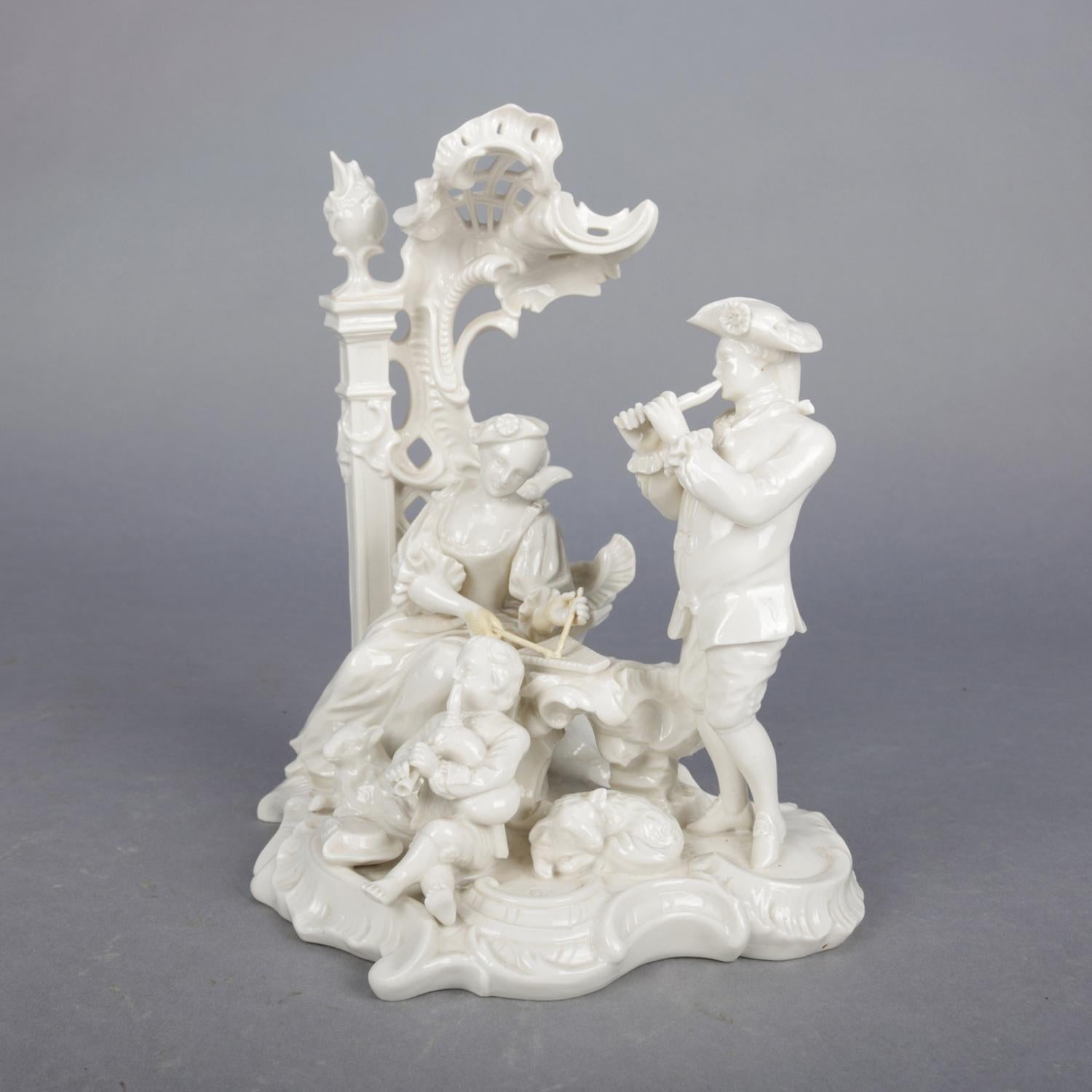 An antique German figural blanc de chine grouping depicts family making music in parlour setting with dog, maker mark on base as photographed, 19th century.

***DELIVERY NOTICE – Due to COVID-19 we are employing NO-CONTACT PRACTICES in the transfer