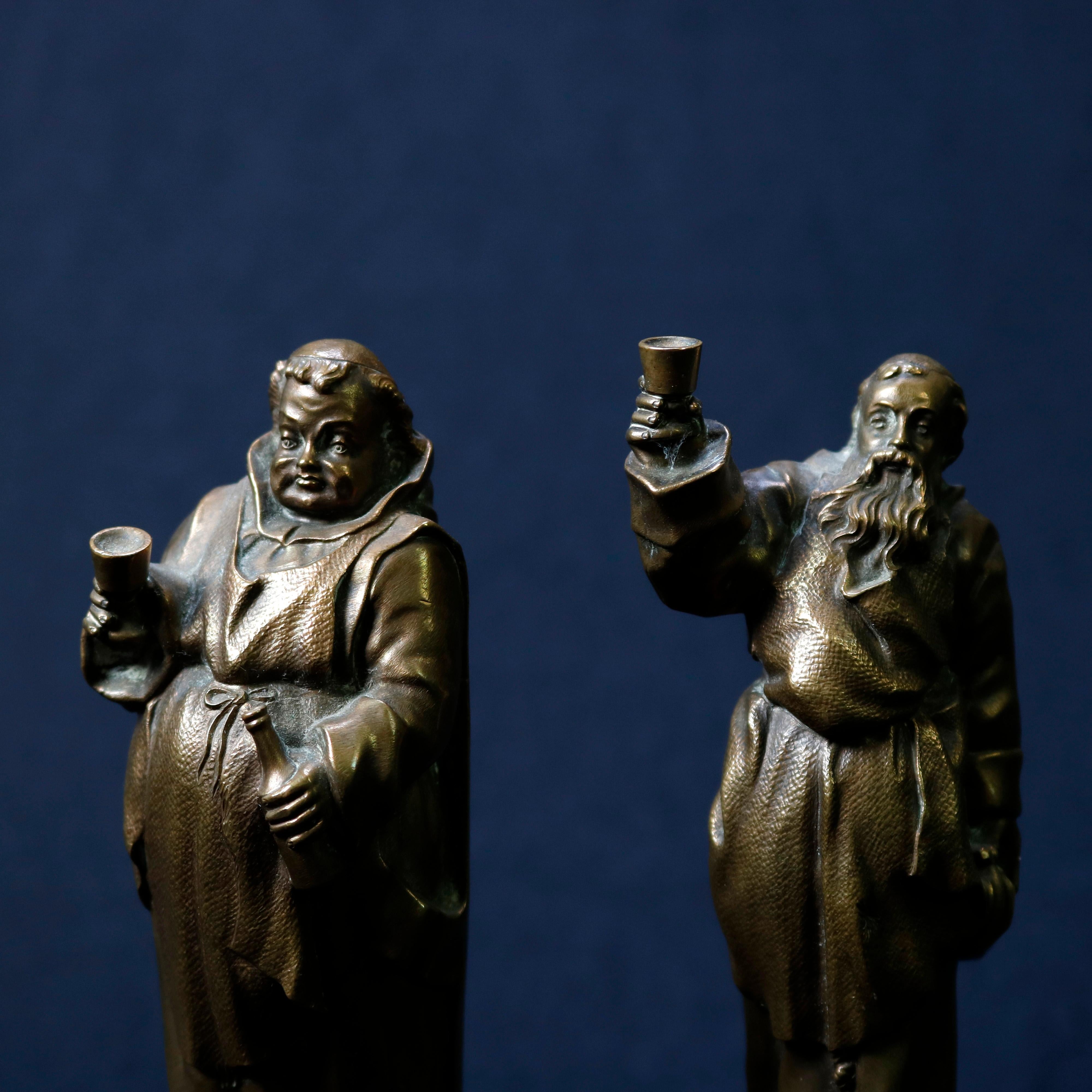 An antique German pair of figural bronze sculptures on marble plinth bases depict monks each with his chalice, plated on bases Rudesheimer & Hochheimer, circa 1890

***DELIVERY NOTICE – Due to COVID-19 we are employing NO-CONTACT PRACTICES in the