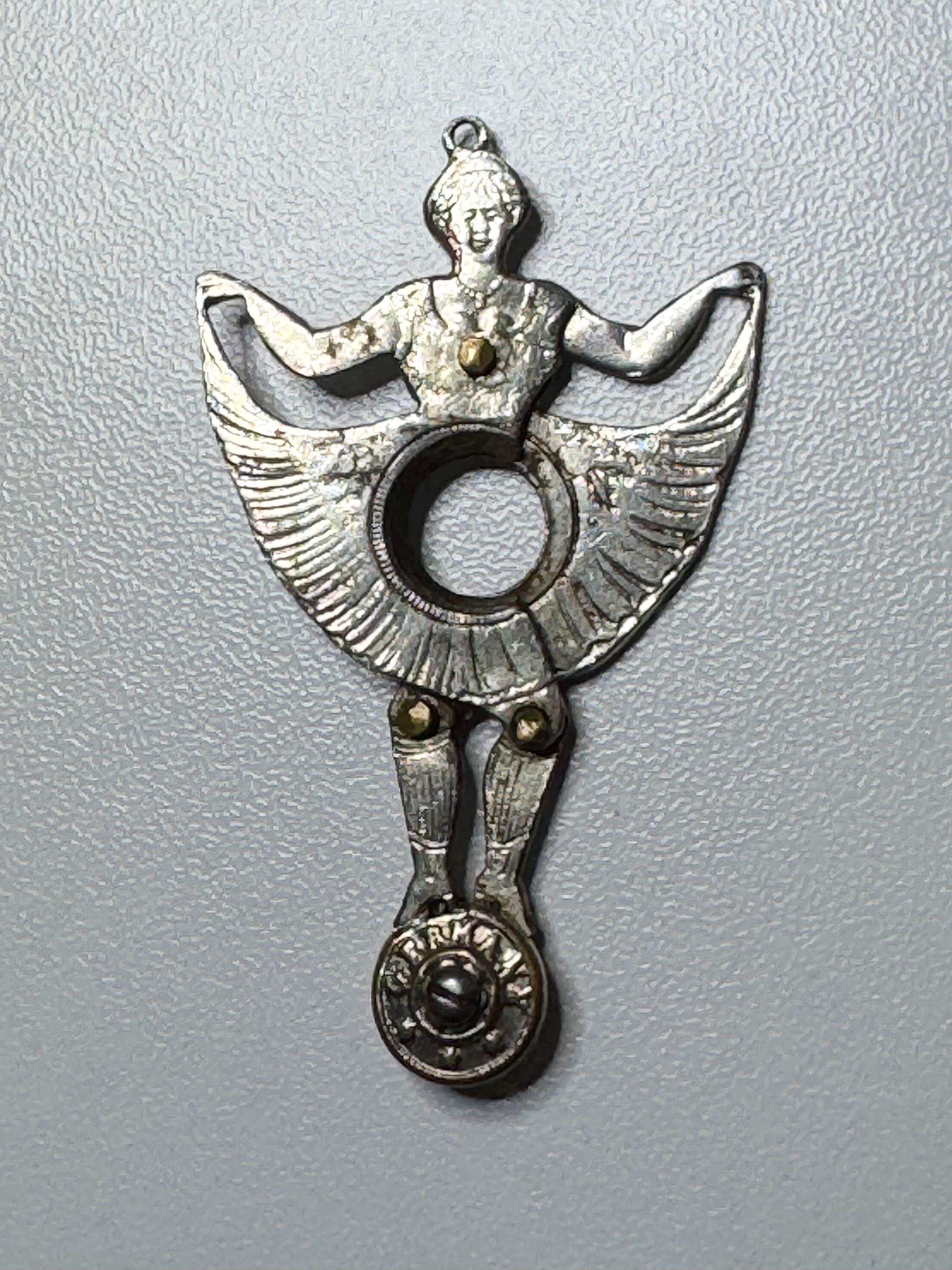 A beautiful cigar cutter, showing a dancing lady. Some wear with a nice patina, but this is old-age. Made of silver-plate metal. Marked Germany it the base. A beautiful nice collectible item or just a display item near your humidor or at your pocket