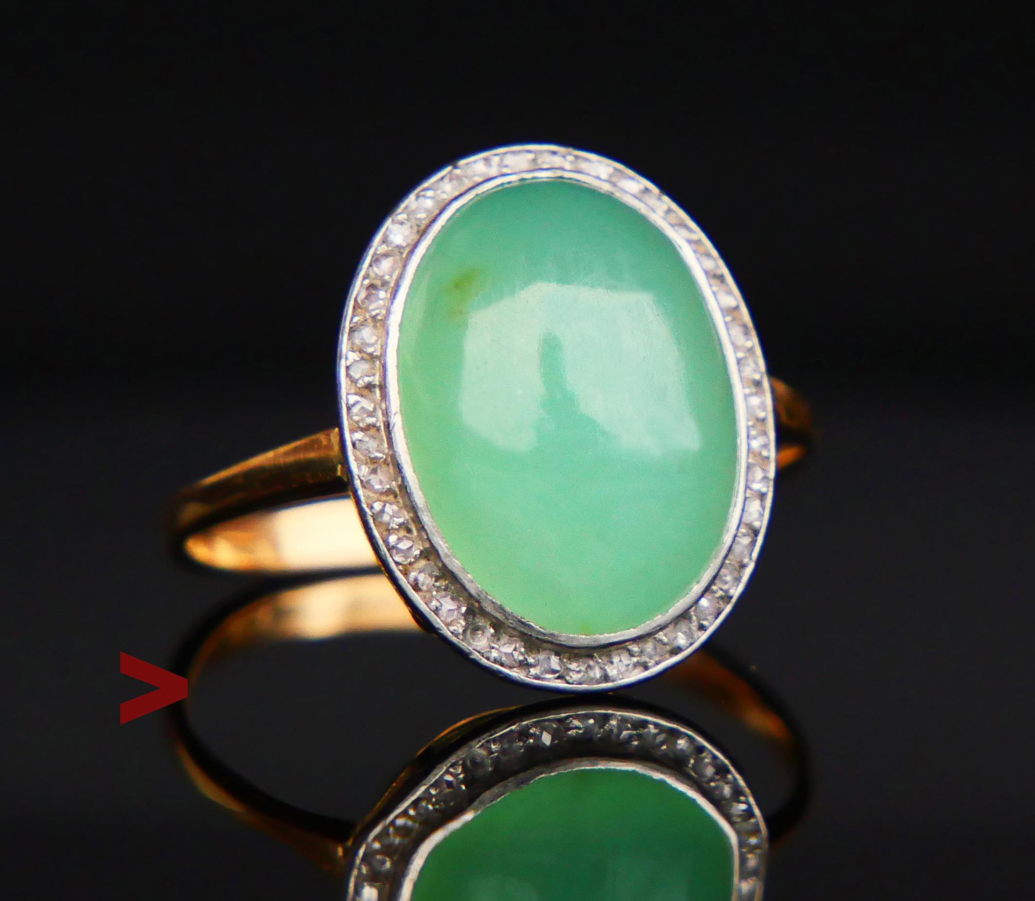 German halo-type Ring made ca. early 1930s. Solid 18K yellow Gold band with top of the crown in White Gold. Bezel set natural Green Chalcedony cabochon cut 15 mm x 12 mm x 6 mm deep/ ca 10 ct. This stone shows minor natural inclusions. Forty paves