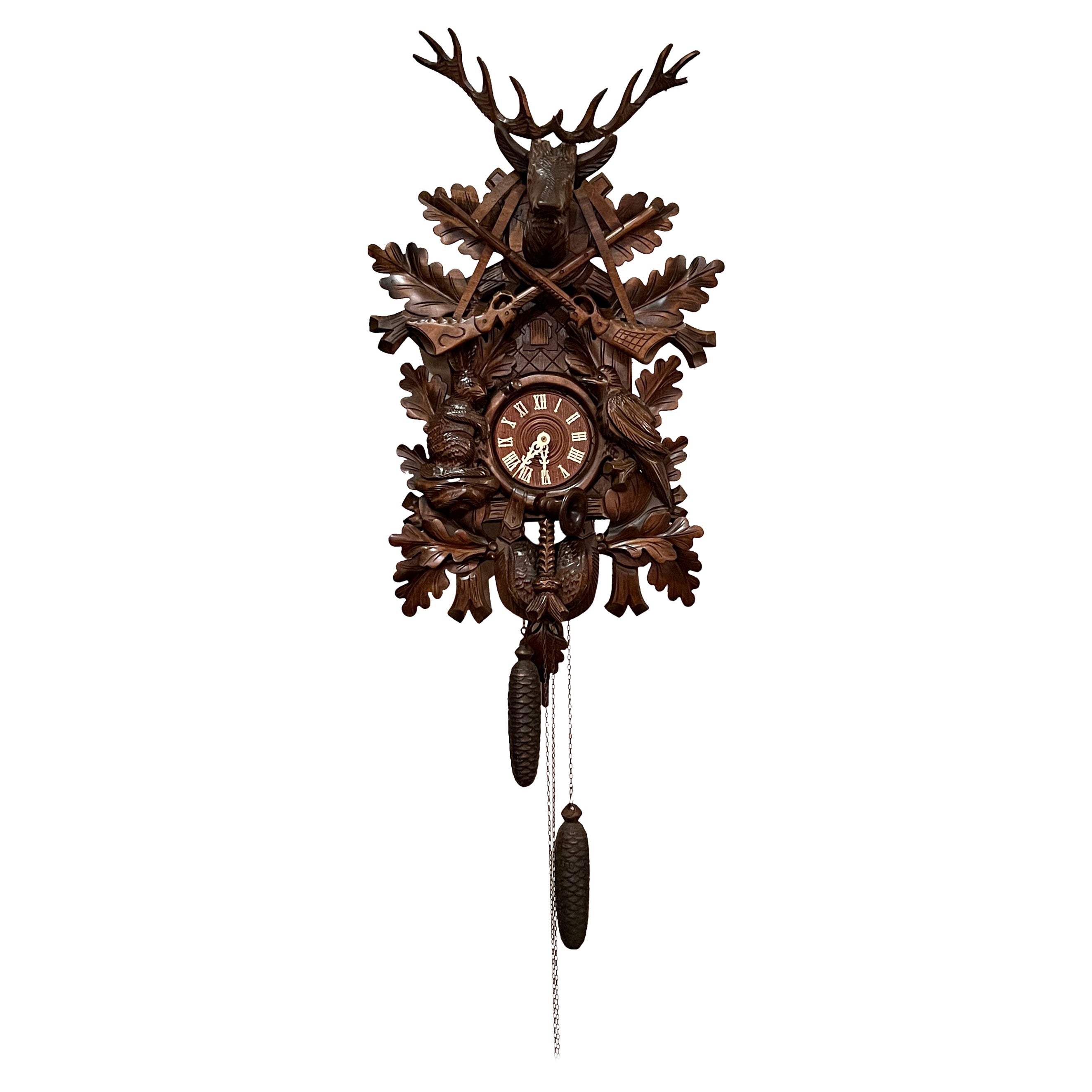 Antiguo reloj "Cuco" alemán tallado a mano de Black Forest, circa 1890.