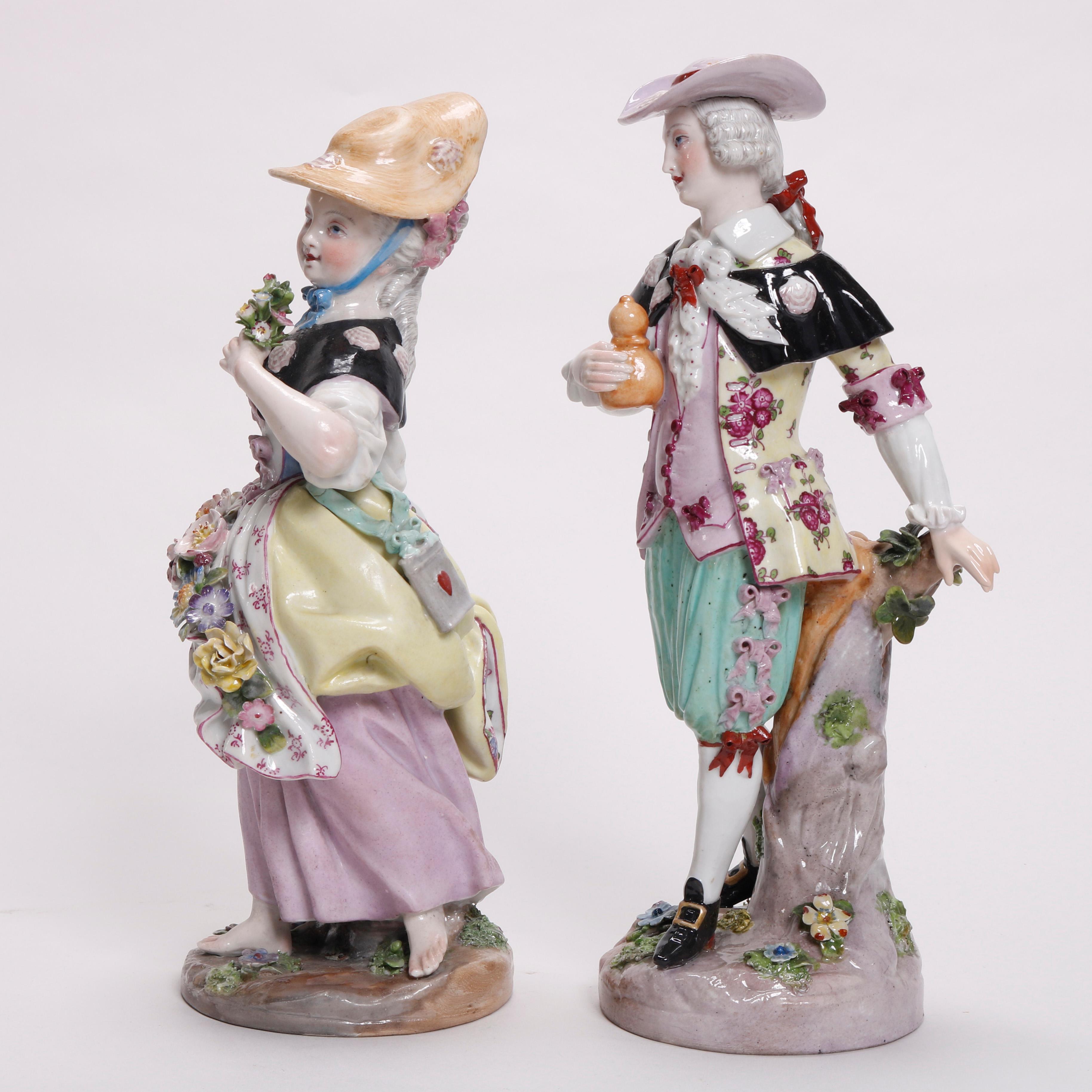 An antique pair of German figures by Meissen offer hand painted porcelain construction and depict courting couple with dog in countryside setting, marked on base as photographed, 19th century.

Measures: 11