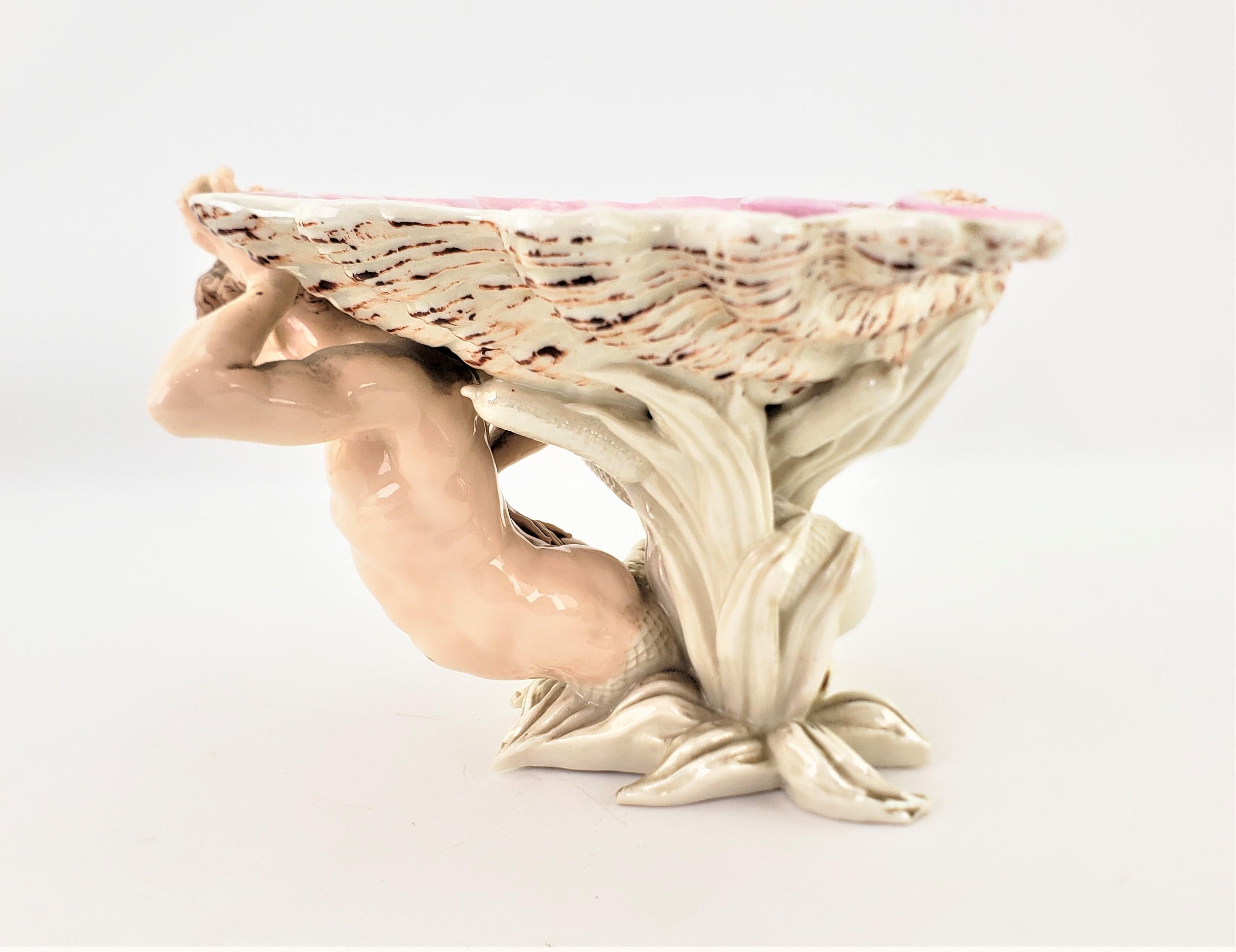 Neoclassical Revival Antique German Hard Paste Porcelain Fantasy Male Mermaid Holding a Shell Bowl For Sale