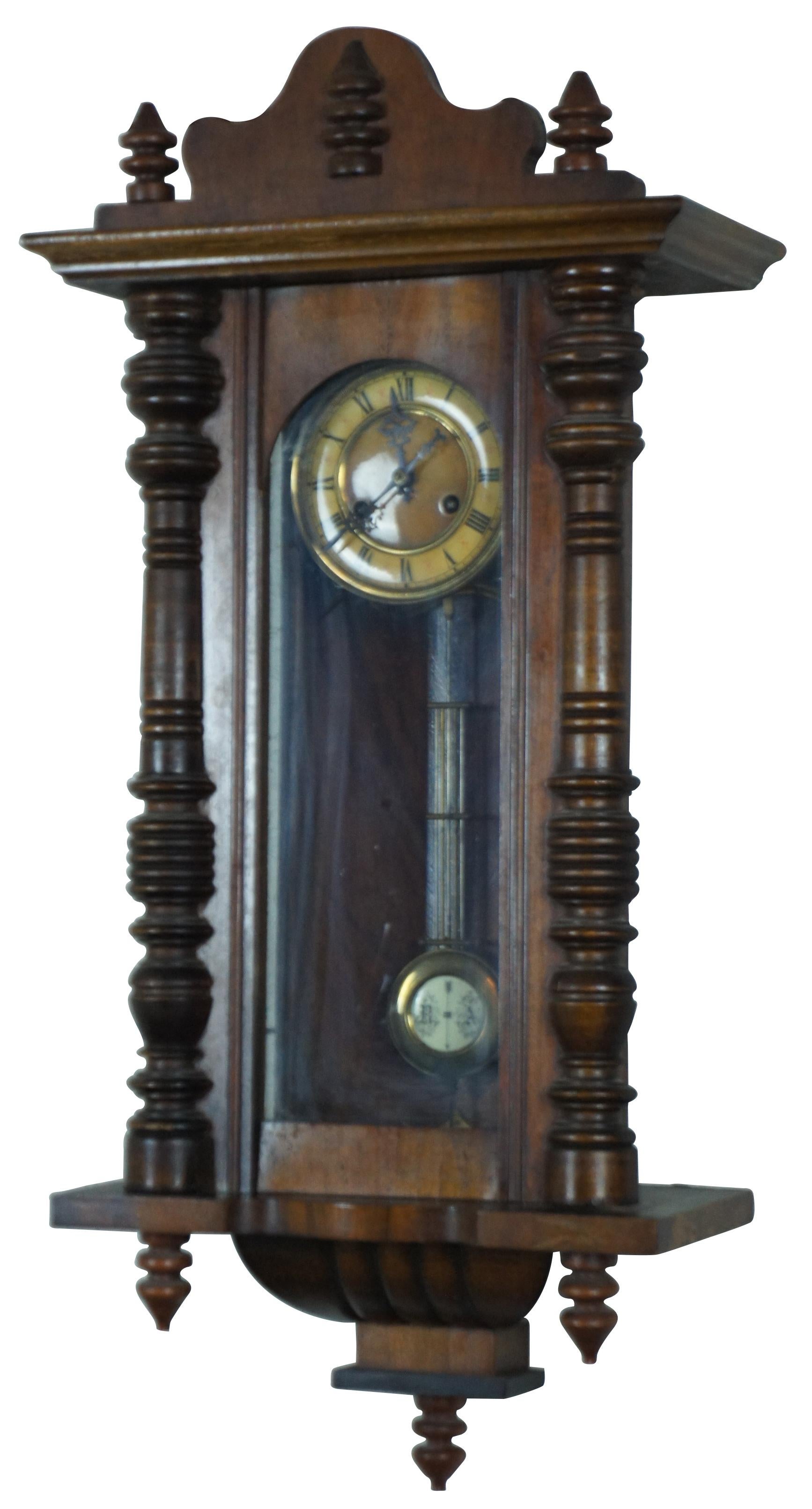Antique early 20th century wall clock with carved wood case with glass on three sides, R-A pendulum, and Kienzle movement.
Measure: 33