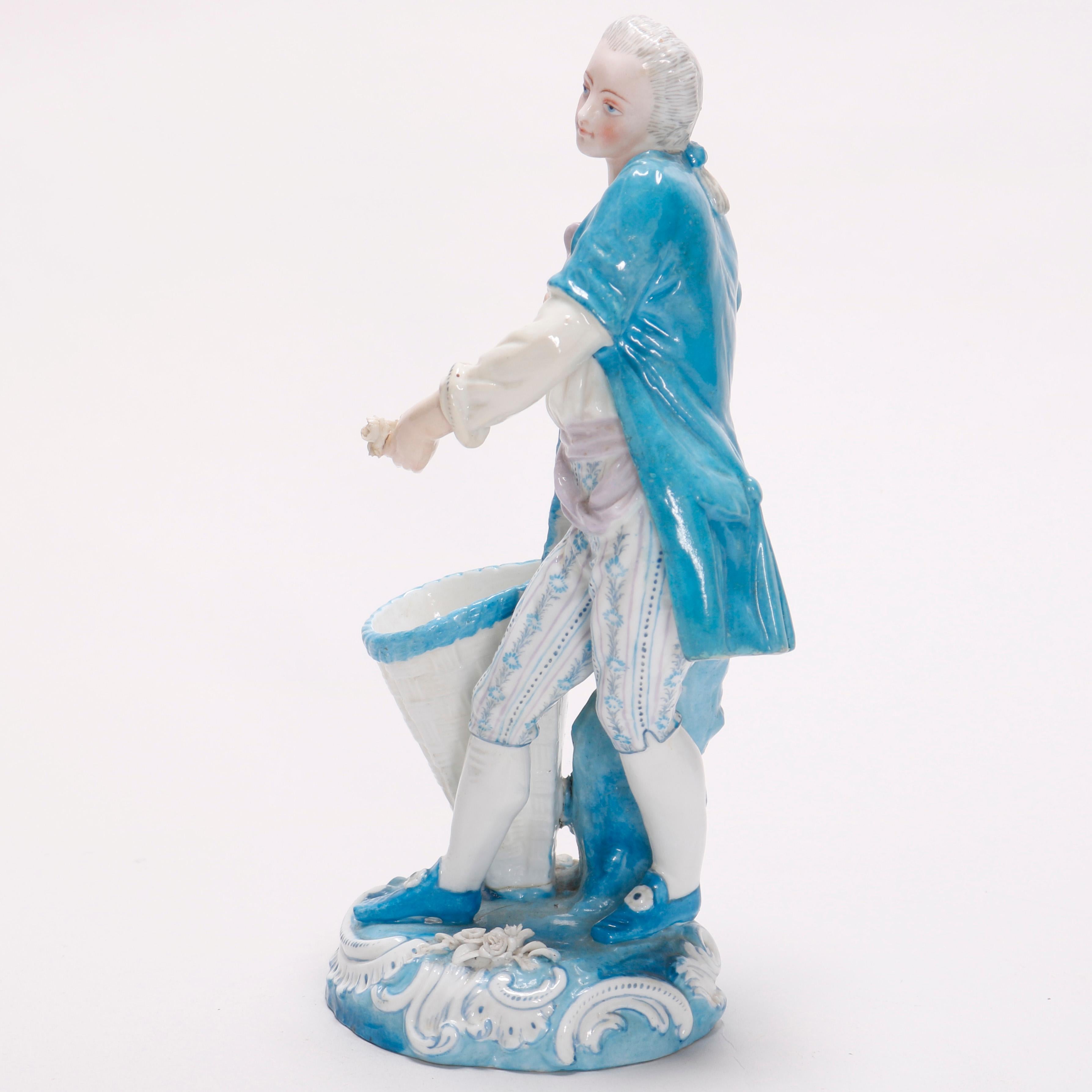 An antique German figural spill vase by KPM offers porcelain construction with figure of man in countryside setting, hand painted with gilt highlights, marked on base as photographed, 19th century

Measures: 9