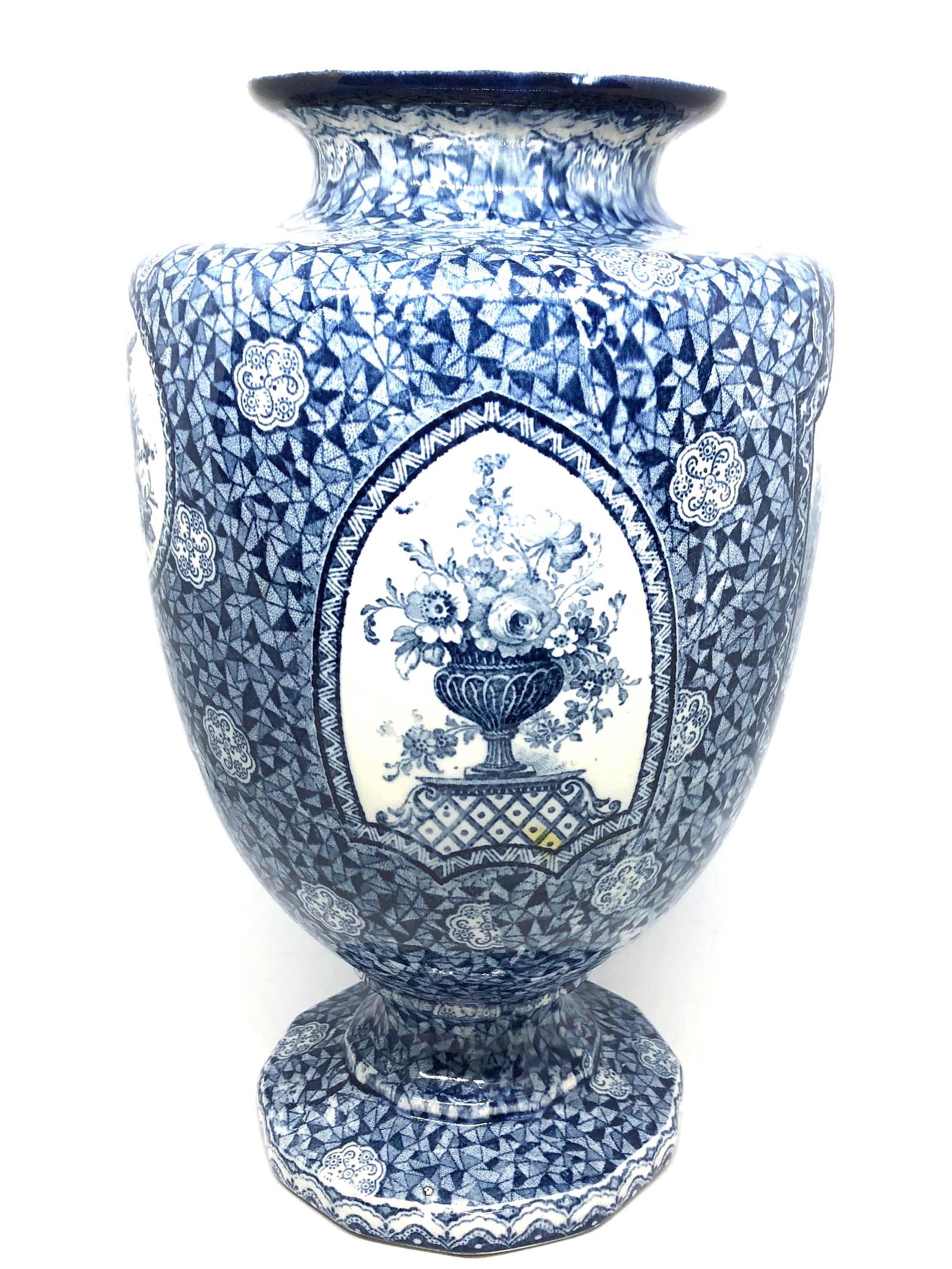 An amazing glazed transferware vase made in Germany, circa 1890s. This is a heavy vase but you can also use it as a sculpture. Vase is in very good condition with no chips, cracks, or flea bites. Unidentifiable 