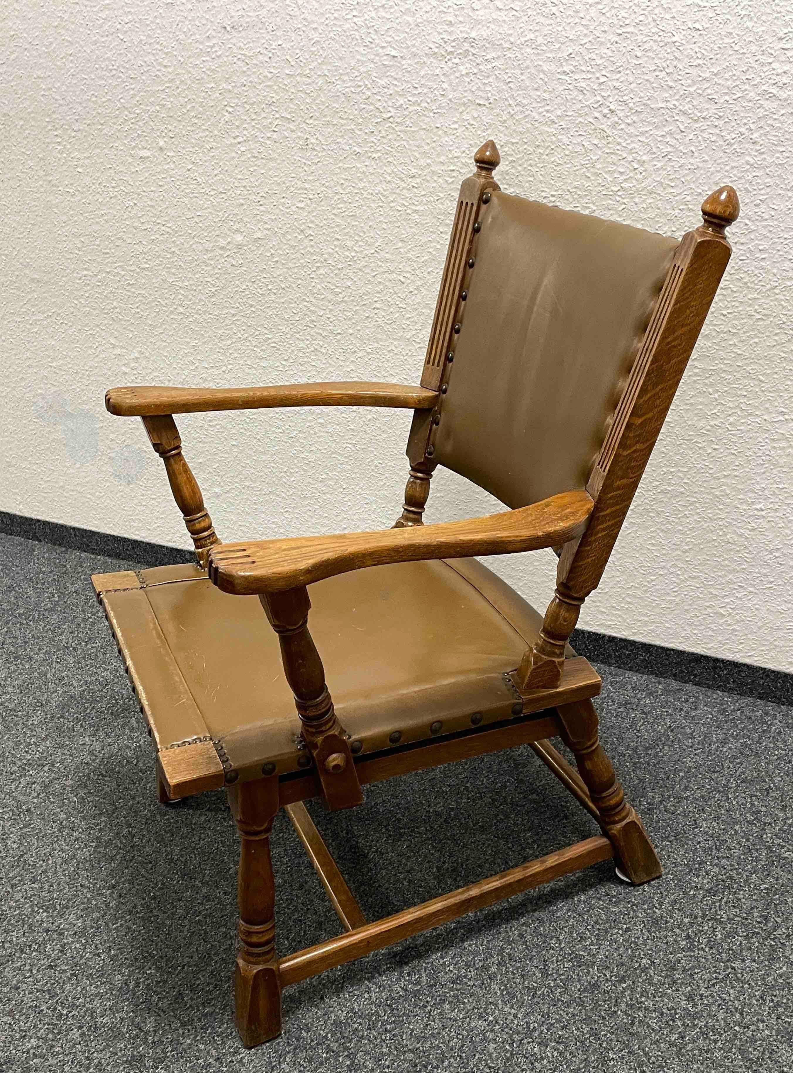 Early 20th Century Antique German Leather & Wood Armchair with Brass Nailhead Details For Sale