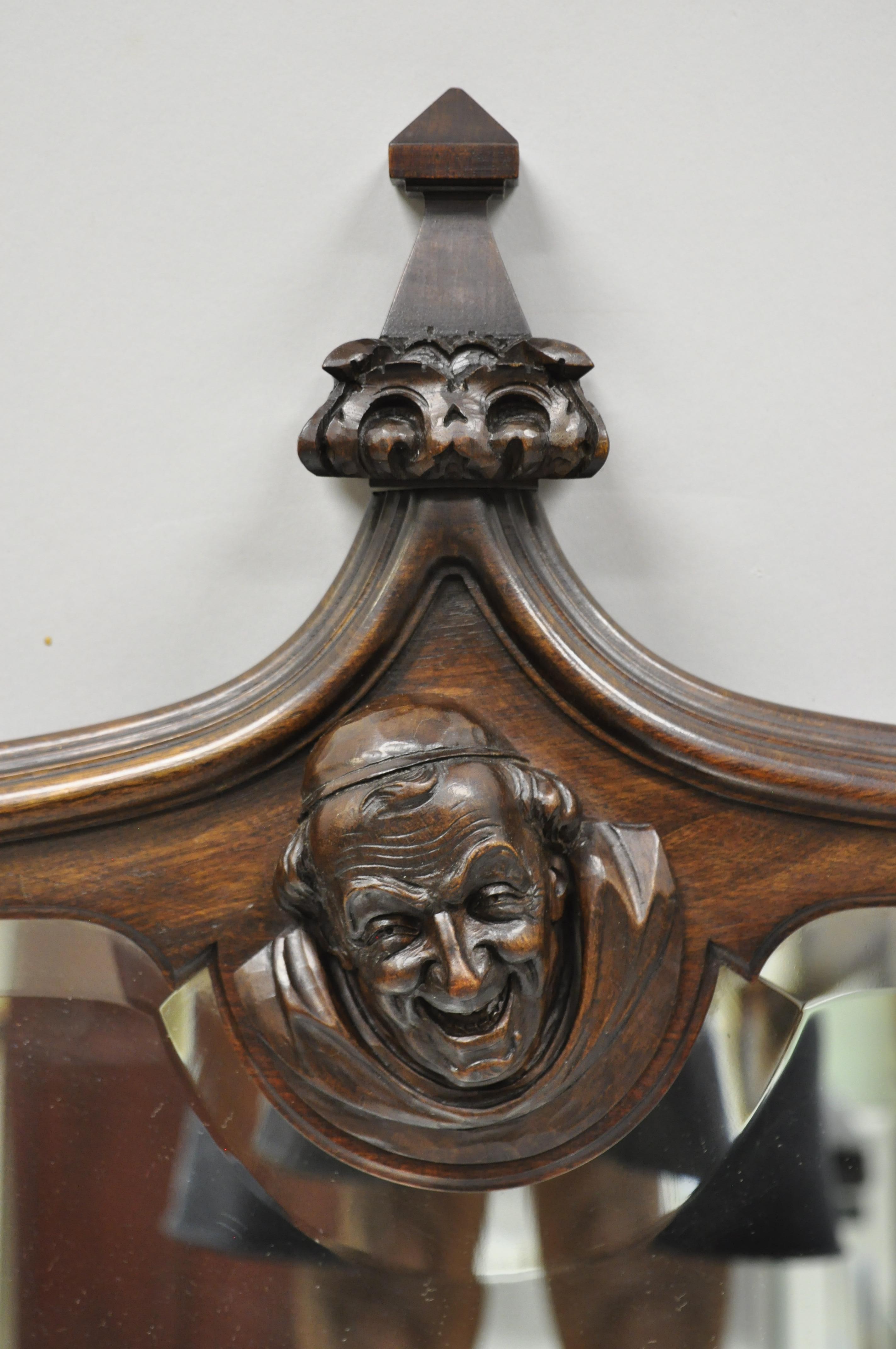 German Medieval over Mantel Mirror with Carved Medieval Monk Face to Crest In Good Condition In Philadelphia, PA