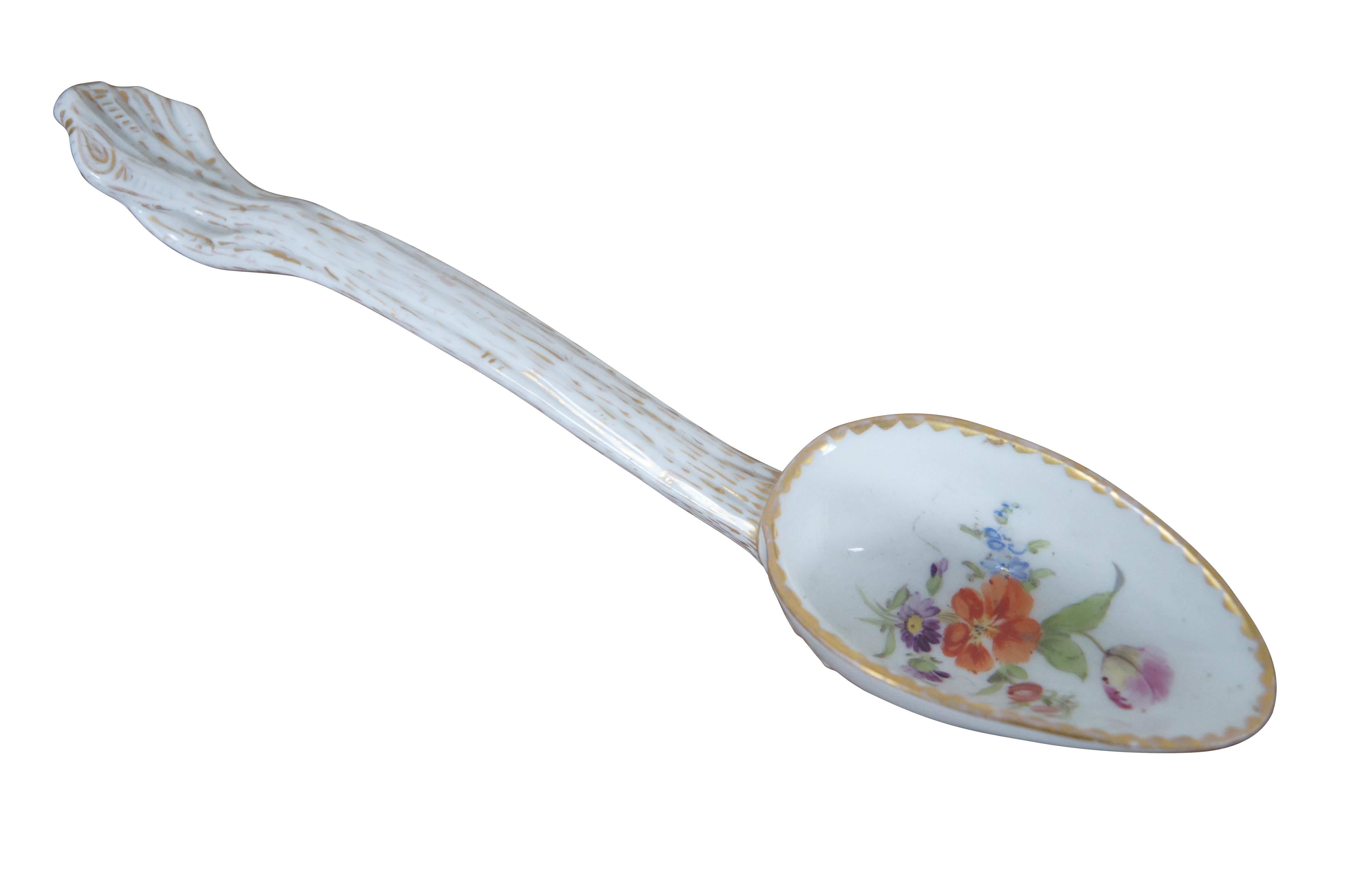 Antique German Meissen Dresden porcelain berry serving spoon featuring floral motif.

DIMENSIONS

8.5